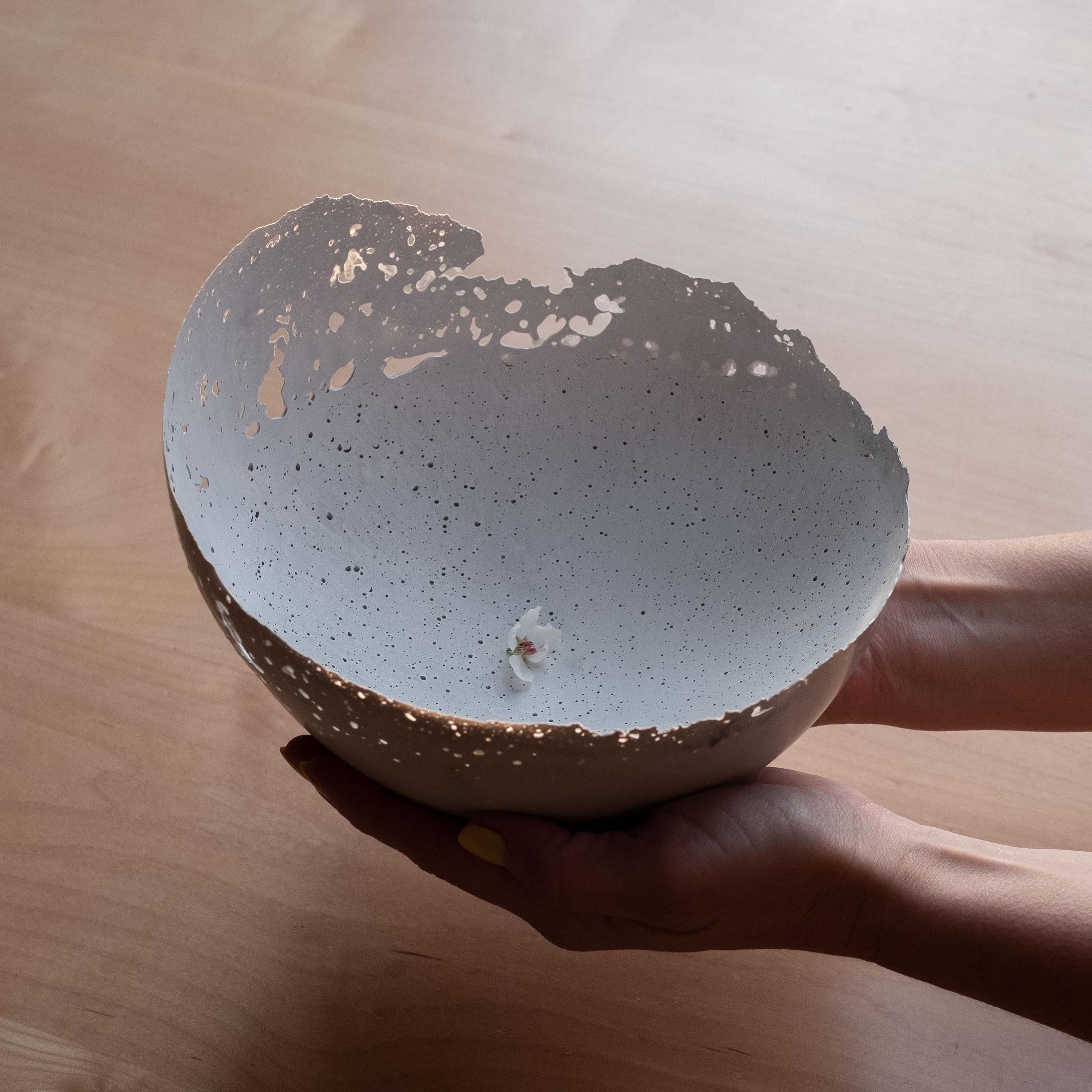 An edition of 150 unique bowls, the concrete Series by UMÉ Studio expresses the tension between heavy concrete and its delicate edge generated by hand pouring. While one assumes concrete should be strong and durable, it is, at its core, fragile.