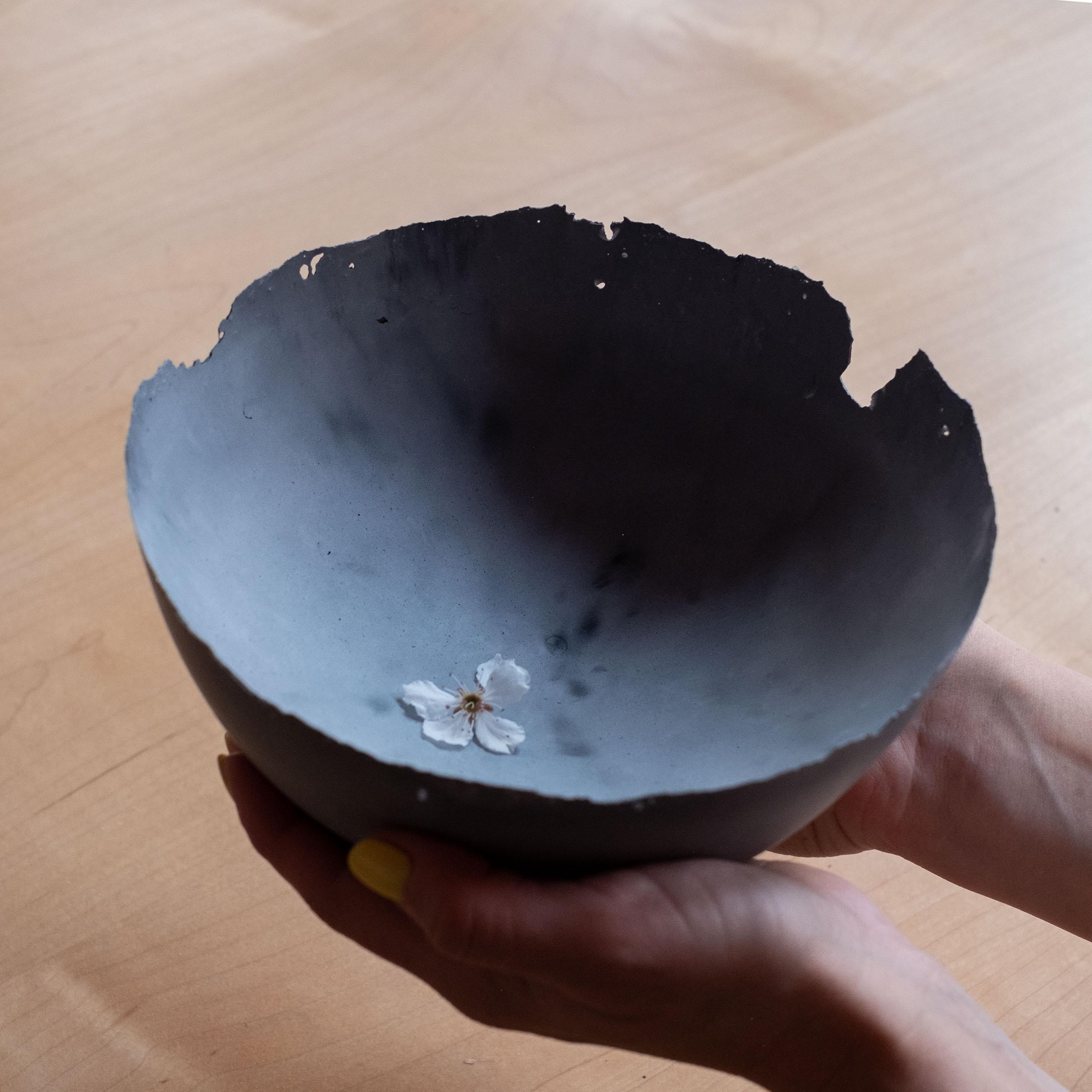 An edition of 150 unique bowls, the concrete Series by UMÉ Studio expresses the tension between heavy concrete and its delicate edge generated by hand pouring. While one assumes concrete should be strong and durable, it is, at its core, fragile.