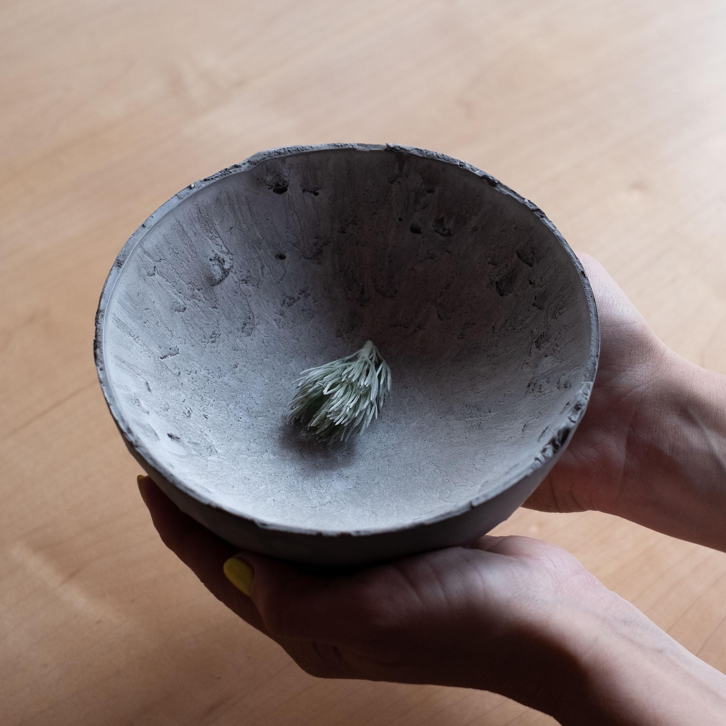 An edition of 150 unique bowls, the concrete Series by UMÉ Studio expresses the tension between heavy concrete and its delicate edge generated by hand pouring. While one assumes concrete should be strong and durable, it is, at its core, fragile.