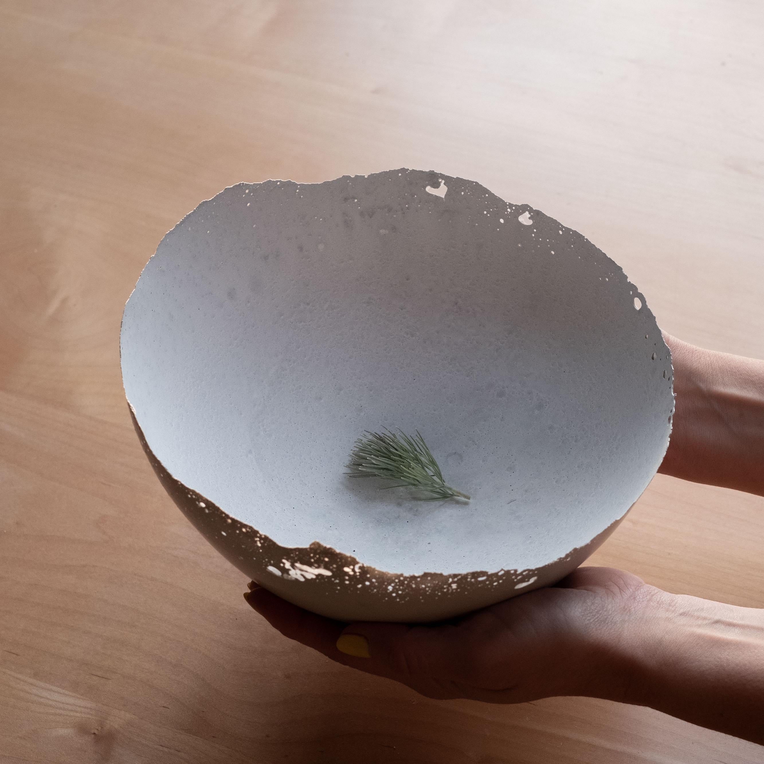 An edition of 150 unique bowls, the concrete Series by UMÉ Studio expresses the tension between heavy concrete and its delicate edge generated by hand pouring. While one assumes concrete should be strong and durable, it is, at its core, fragile.