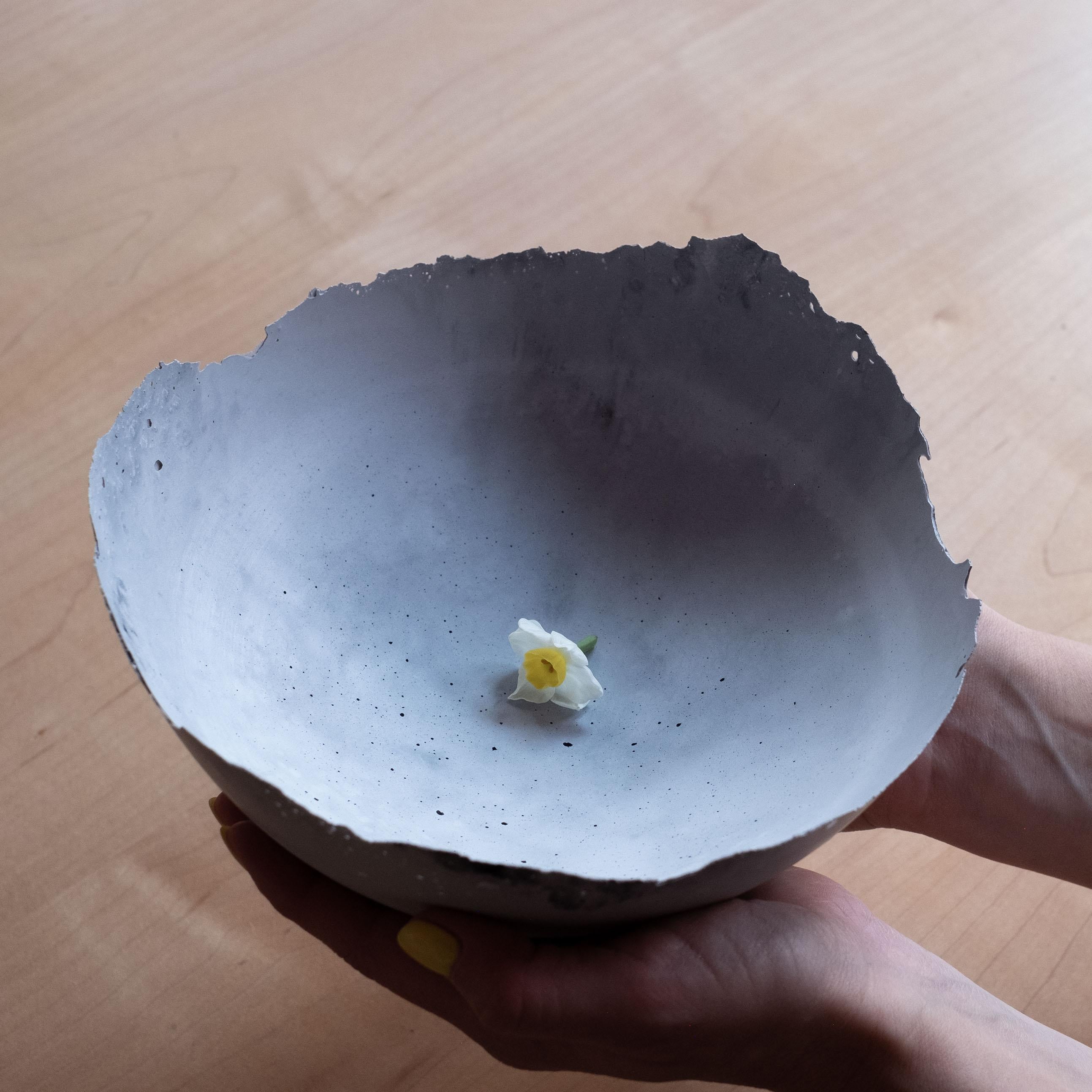 An edition of 150 unique bowls, the concrete Series by UMÉ Studio expresses the tension between heavy concrete and its delicate edge generated by hand pouring. While one assumes concrete should be strong and durable, it is, at its core, fragile.