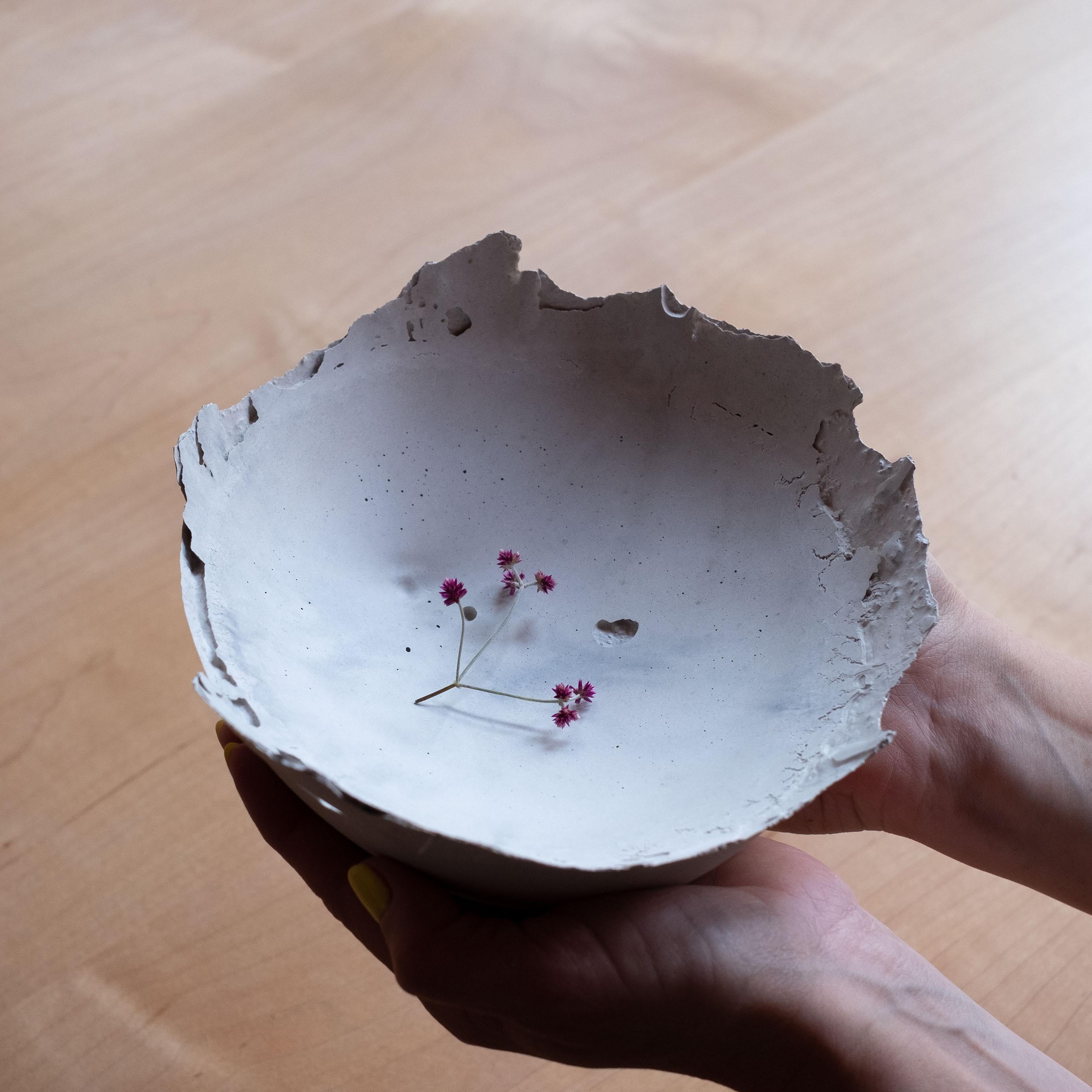 An edition of 150 unique bowls, the concrete Series by UMÉ Studio expresses the tension between heavy concrete and its delicate edge generated by hand pouring. While one assumes concrete should be strong and durable, it is, at its core, fragile.