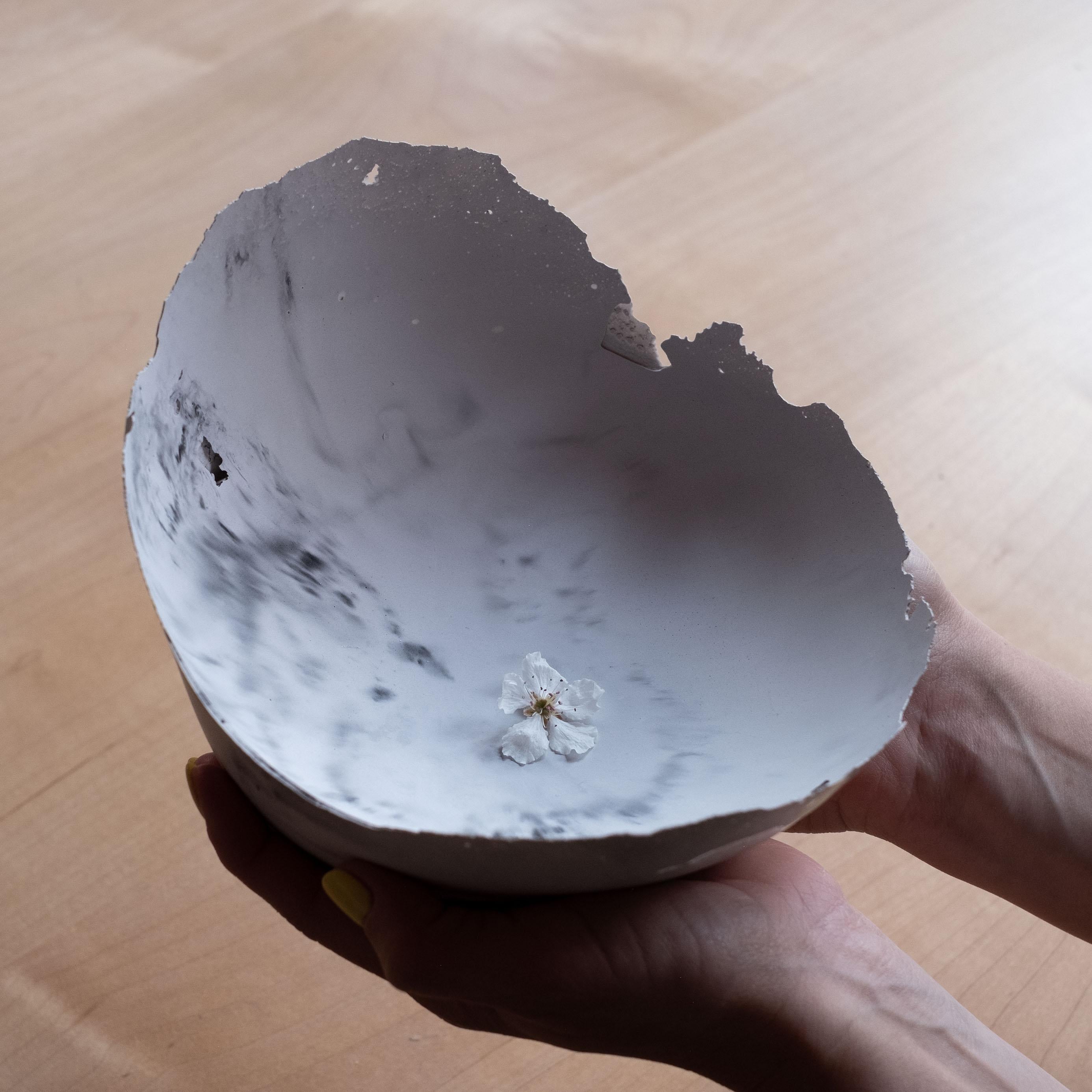 An edition of 150 unique bowls, the concrete Series by UMÉ Studio expresses the tension between heavy concrete and its delicate edge generated by hand pouring. While one assumes concrete should be strong and durable, it is, at its core, fragile.