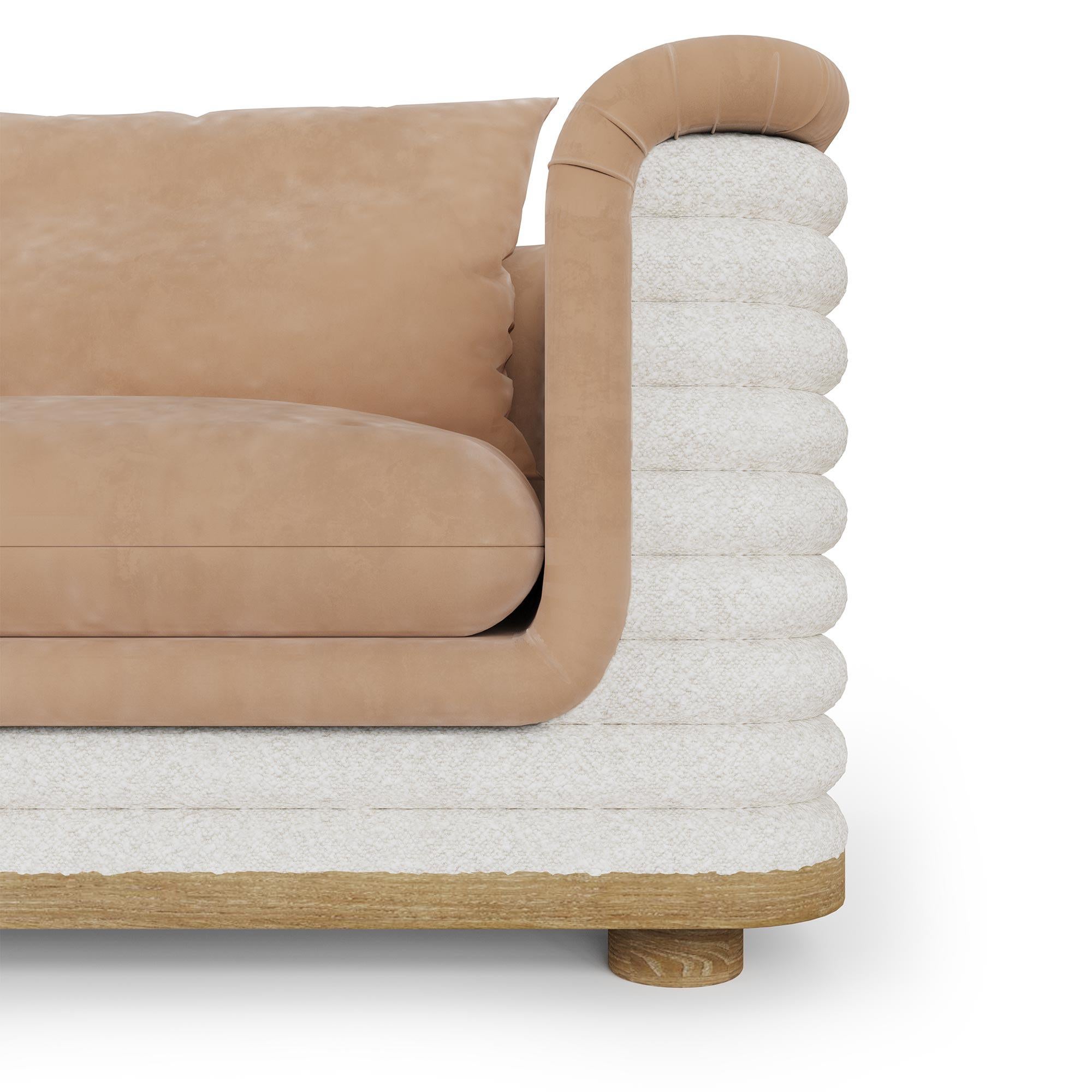 Entdecken Sie die perfekte Mischung aus Komfort und Stil mit dem Nolita Harbour Céline Sessel. Dieses exquisit gestaltete Möbelstück verleiht jedem Wohnraum einen Hauch von Raffinesse. Die einzigartige Kombination aus Boucle- und Samtstoffen sorgt