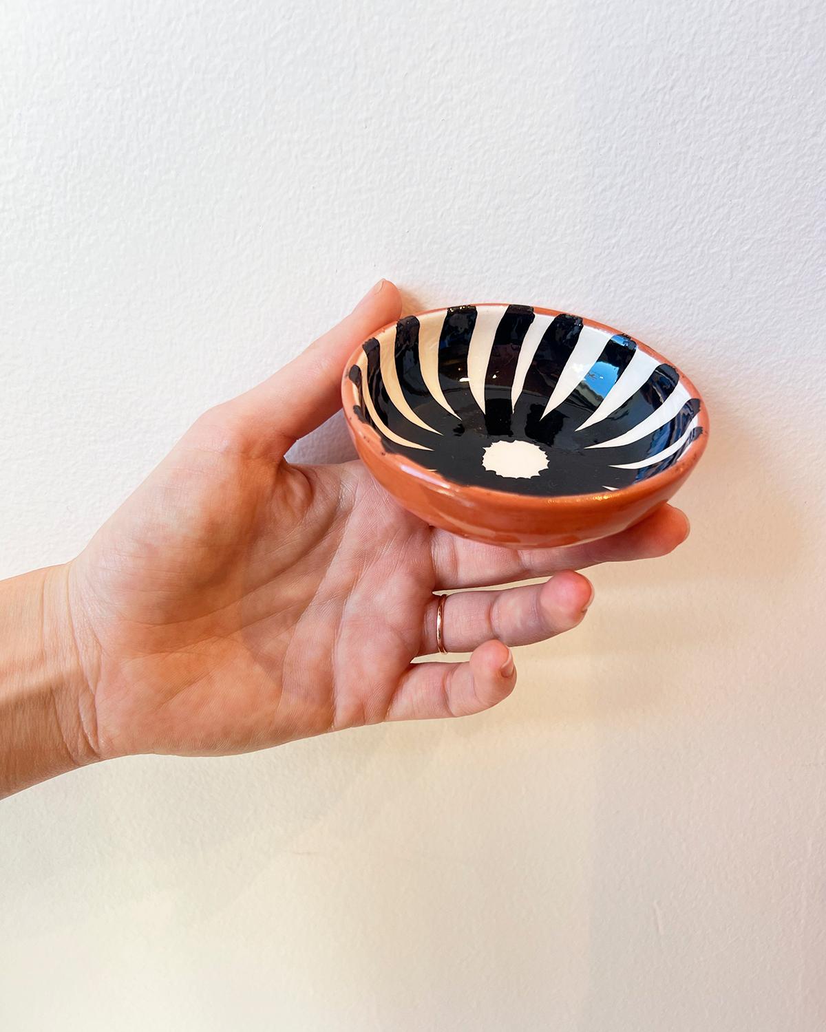 Small Bowls with Bold Graphic Patterns

These mini bowls are perfect to use as a salt or pepper bowls. We also love to use them for dipping sauces or fresh or dried herbs and spices. A little bowl like this can add a lot of charm to a table and