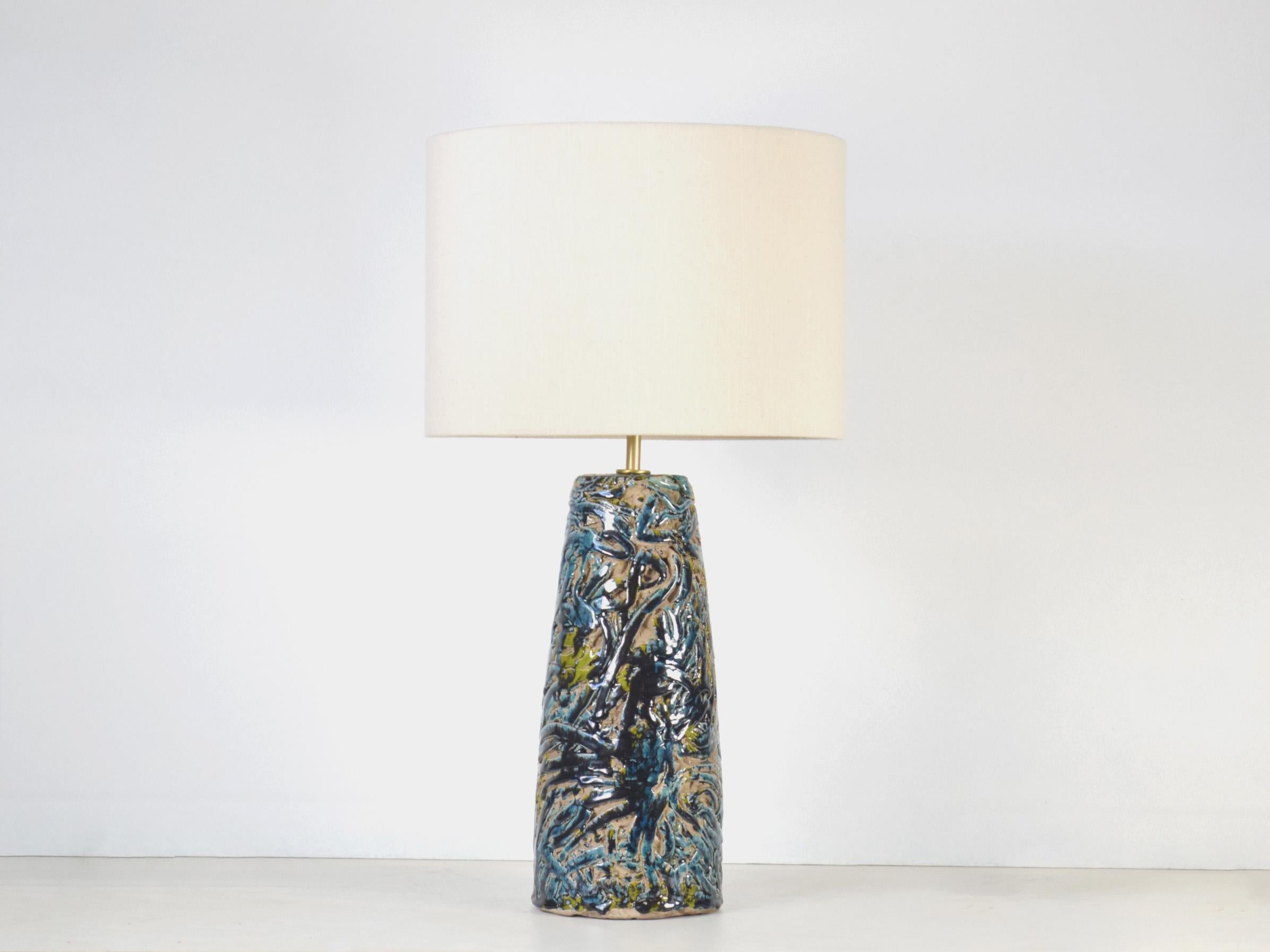 Handmade Ceramic Lamp by DEBARRO in Portugal
Dimensions: H 65 x Ø 35 cm, including lampshade
Materials: Glazed Ceramic and Brass
Bulb: E27 LED (not included)

All our lamps can will wired according to each location: America, Europe, United Kingdom,