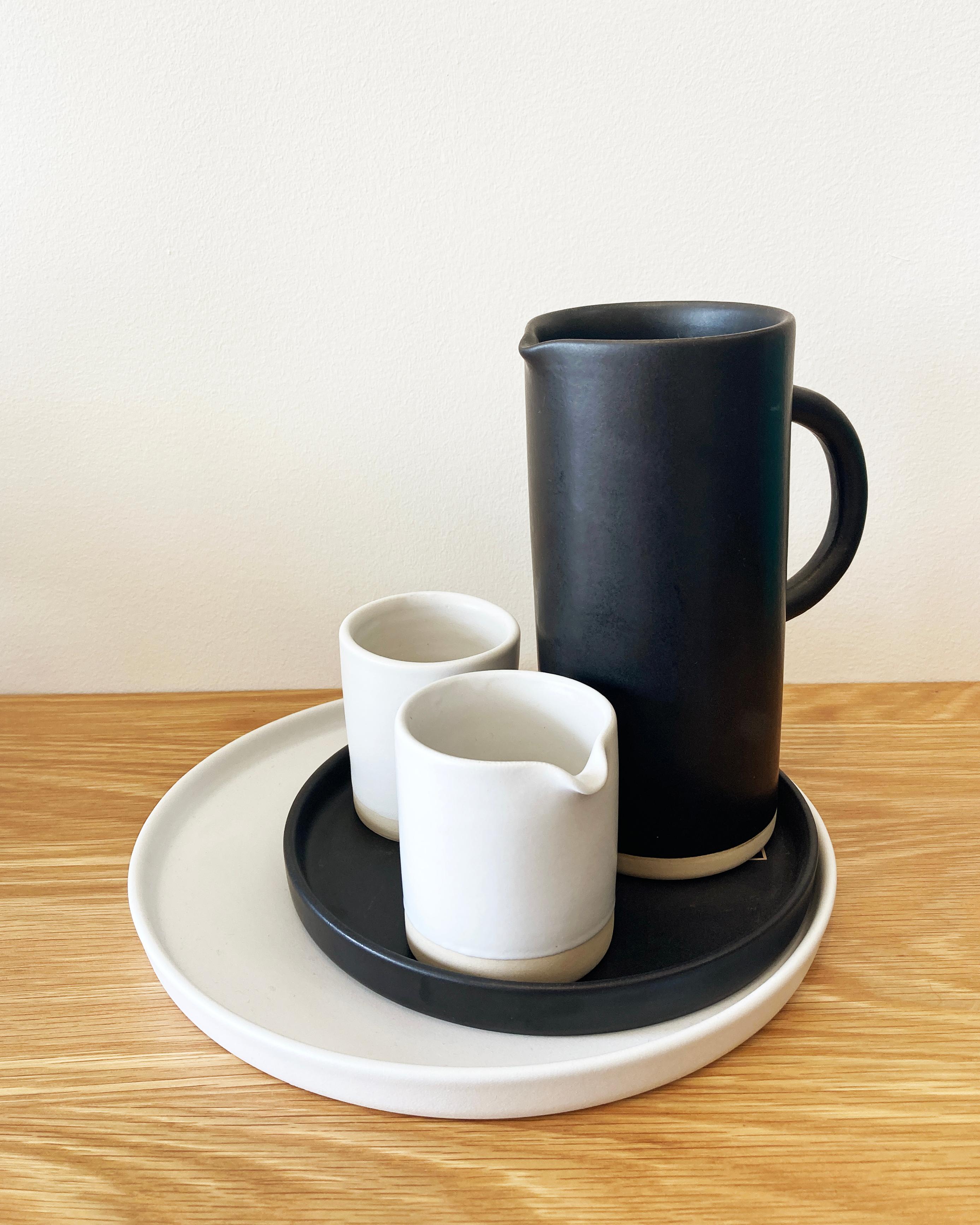 Perfect for serving cream, milk, or milk substitute for your morning tea or coffee. These are handmade stoneware, so they are dishwasher and microwave safe. Also available in black. 

Handmade and hand painted ceramics from Portugal, these beautiful