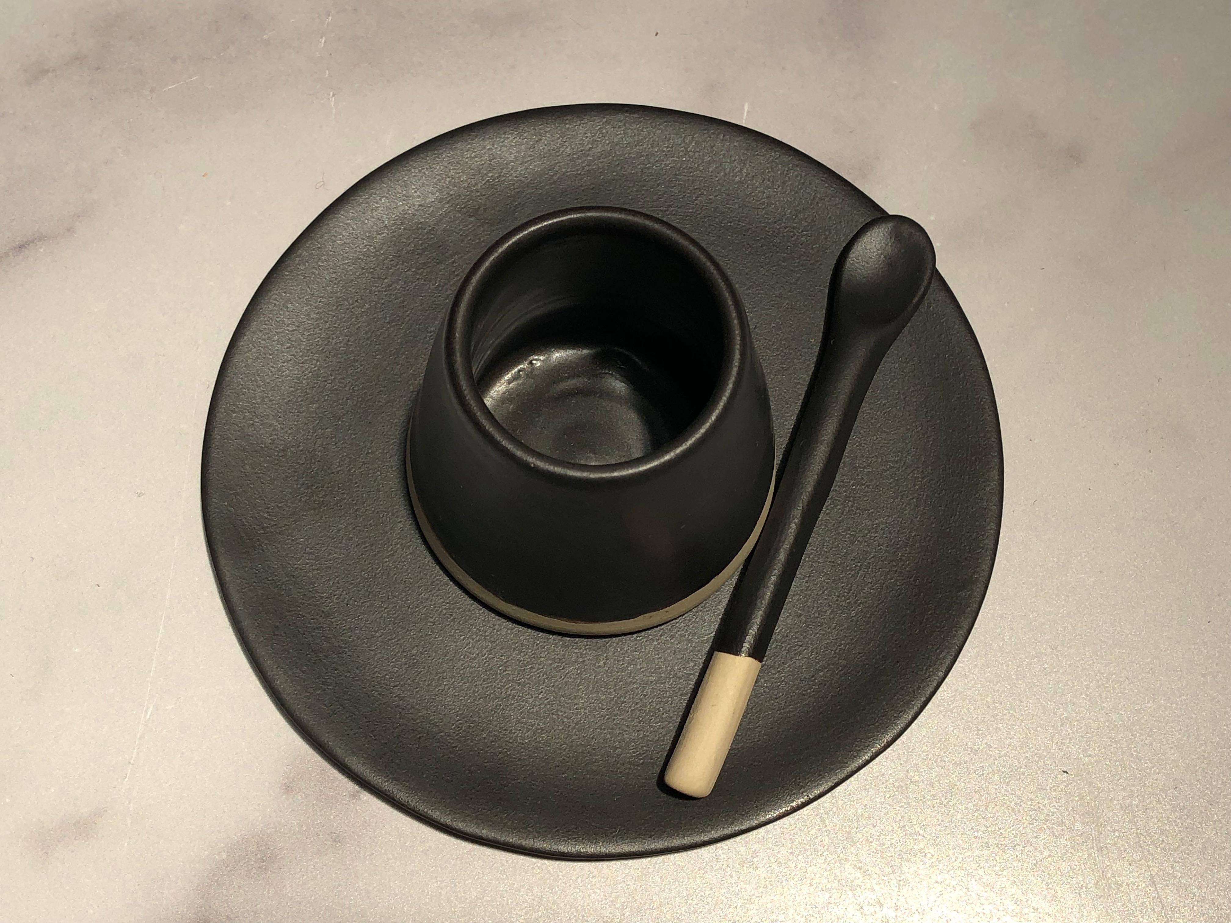 Handmade and hand painted ceramics from one of the mother countries, Portugal, these beautiful pieces for your table will add a modern touch and are perfect to mix and match. This matte-glazed saucer is available in black or white.

Size: 5”