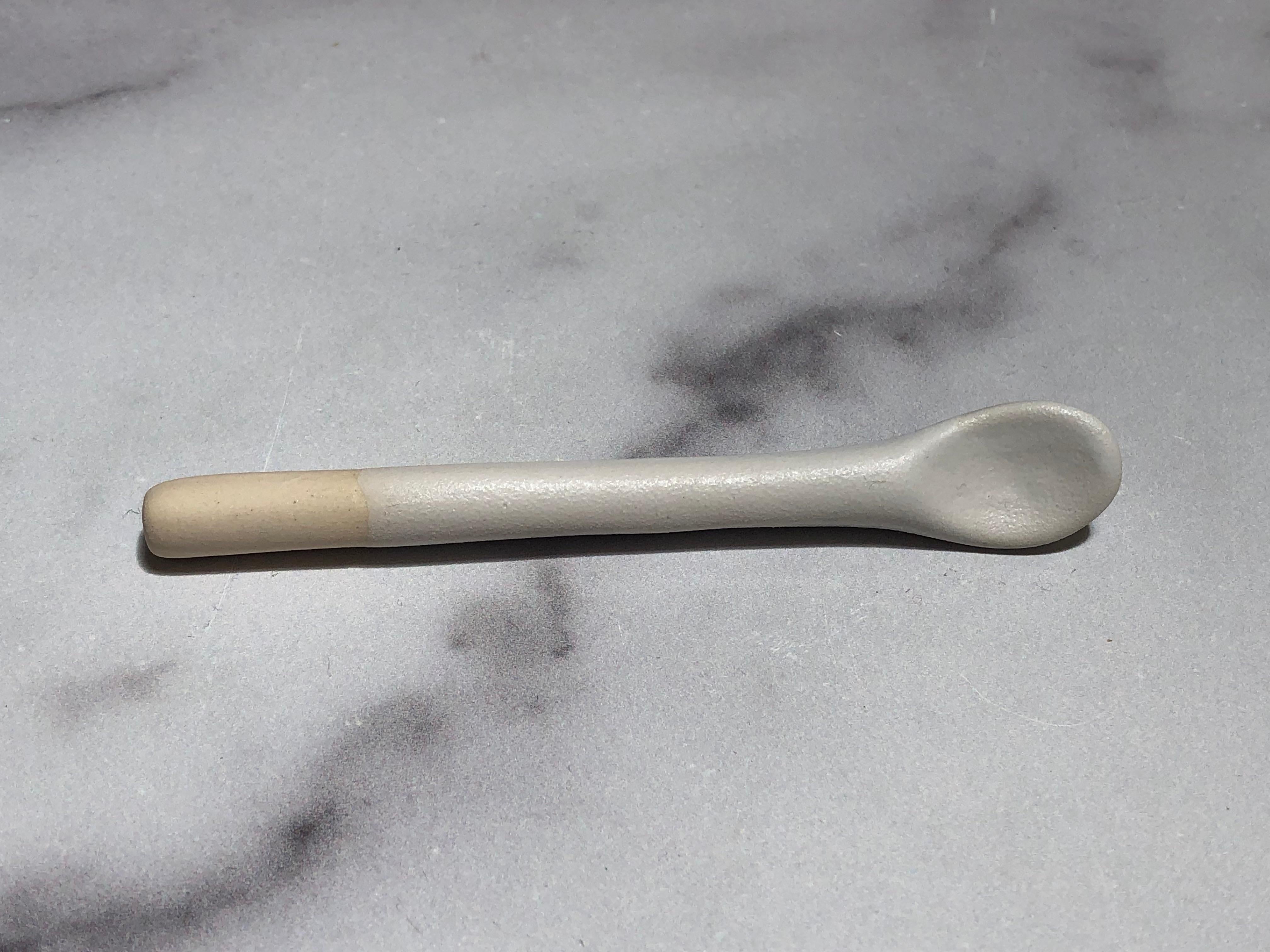 Handmade and hand painted ceramics from one of the mother countries, Portugal, these beautiful pieces for your table will add a modern touch and are perfect to mix and match. This matte-glazed spoon is available in black or white.

Size: