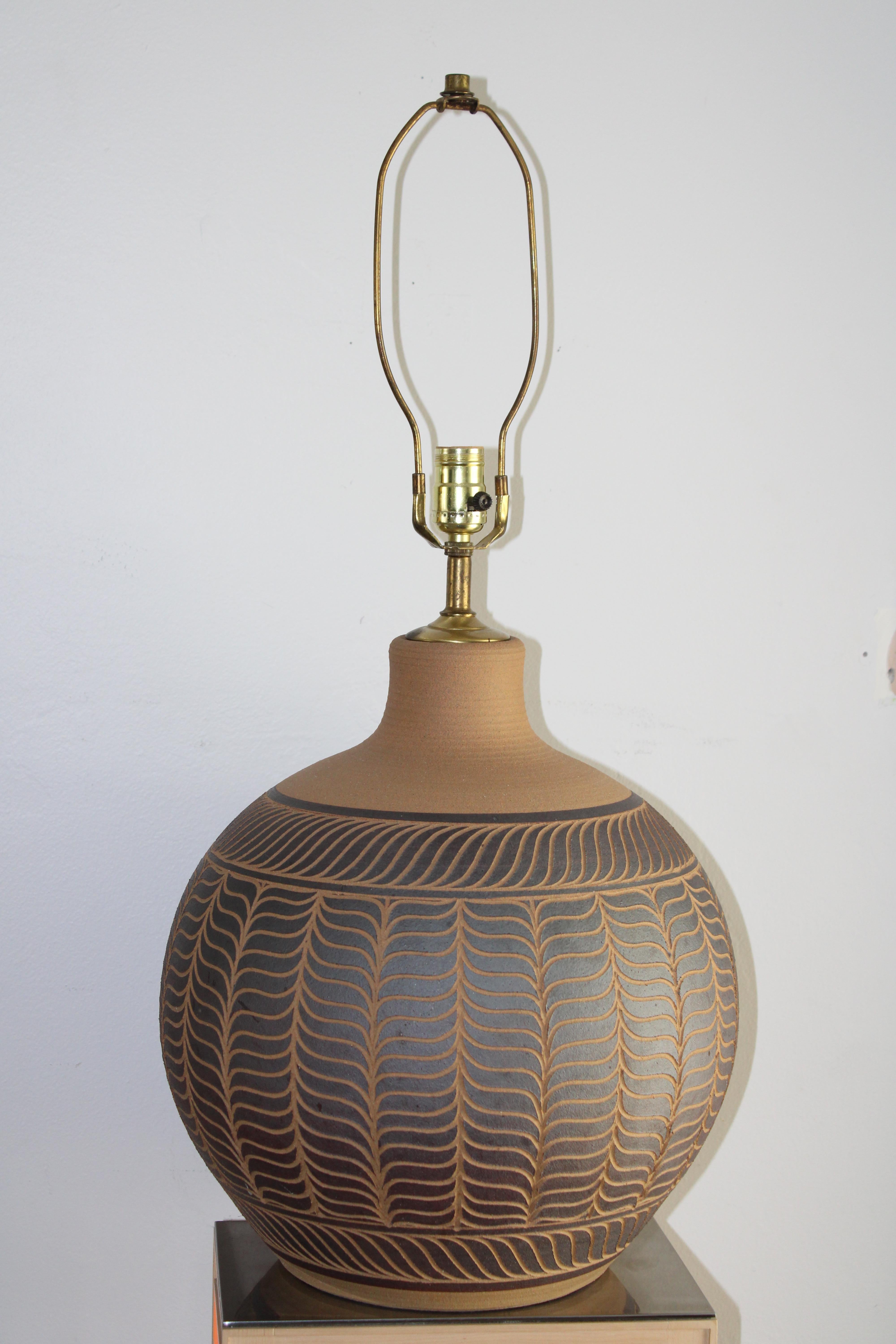 This is a beautiful round sphere handmade ceramic glazed table lamp by Oregon ceramicists Larry and Terry Brown, signed “Brown” next to the cord hole on the bottom. Ceramic portion is 16.25