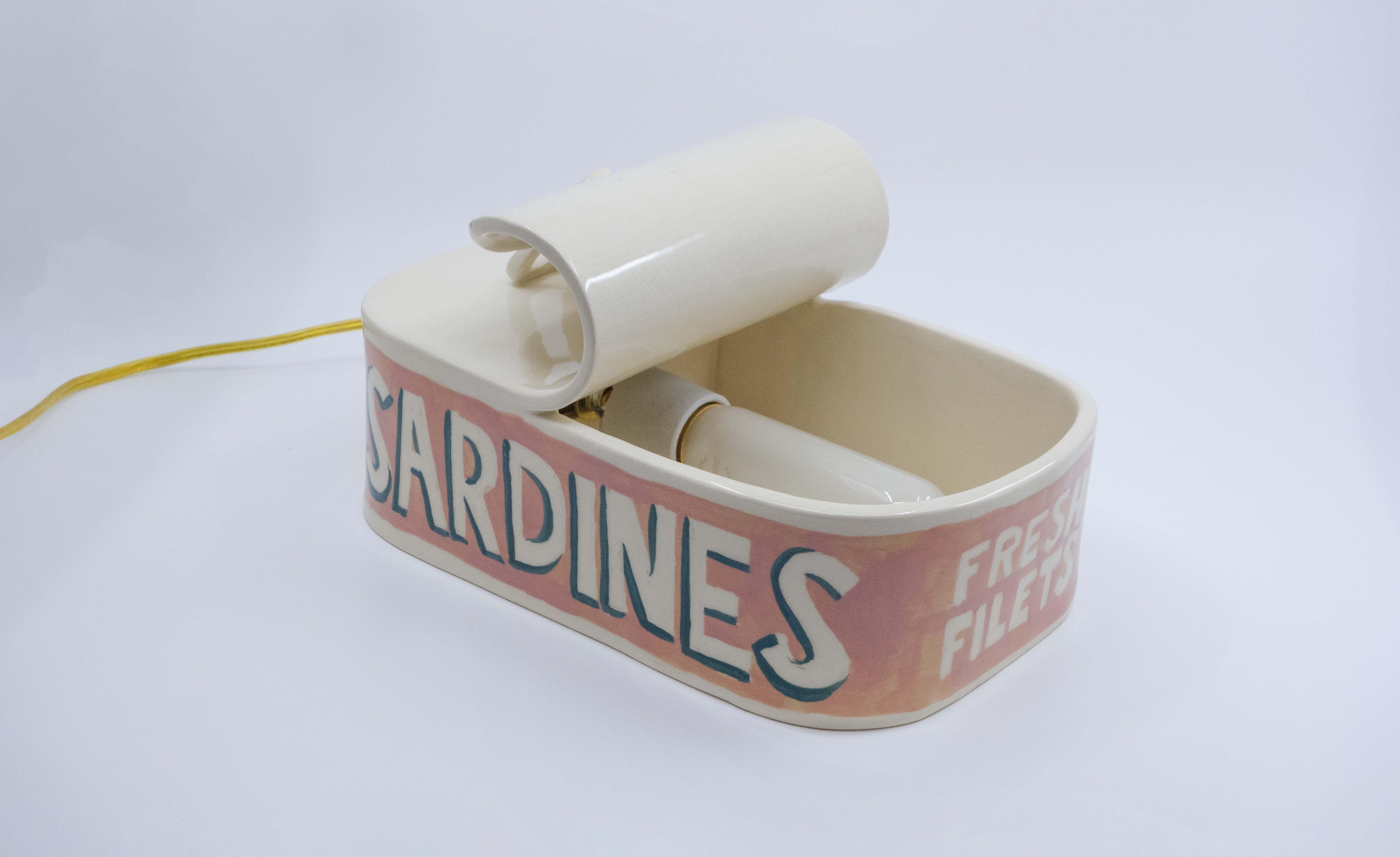 Canned fish is having a comeback—So why not bring a decorative, jumbo-sized one into your home to up-light your space? Don't worry, it doesn't smell fishy. 

The Sardine Can Lamp, created by Ethan Streicher, the founder and artist behind the studio