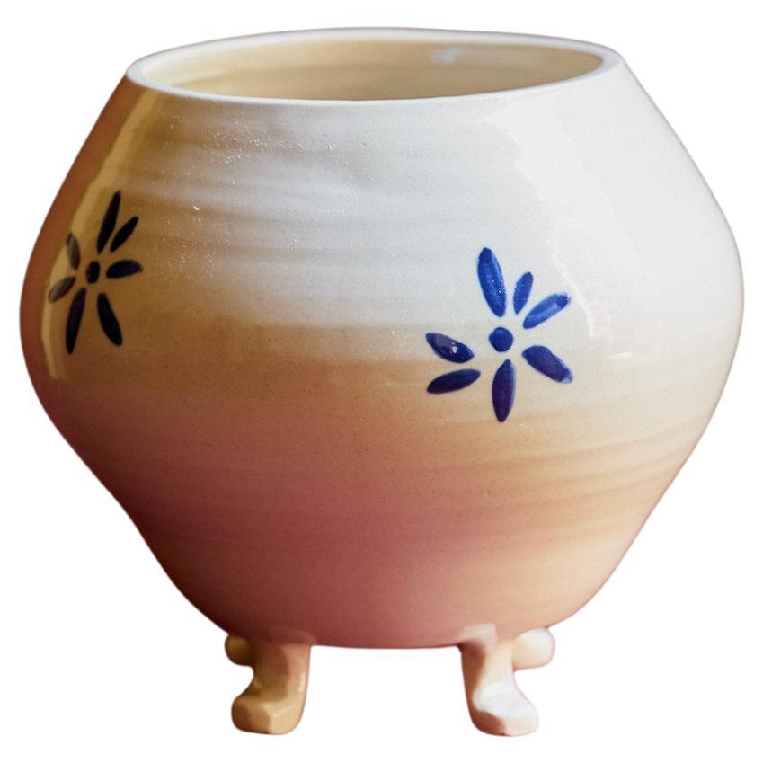 Handmade ceramic vase with painted flowers design