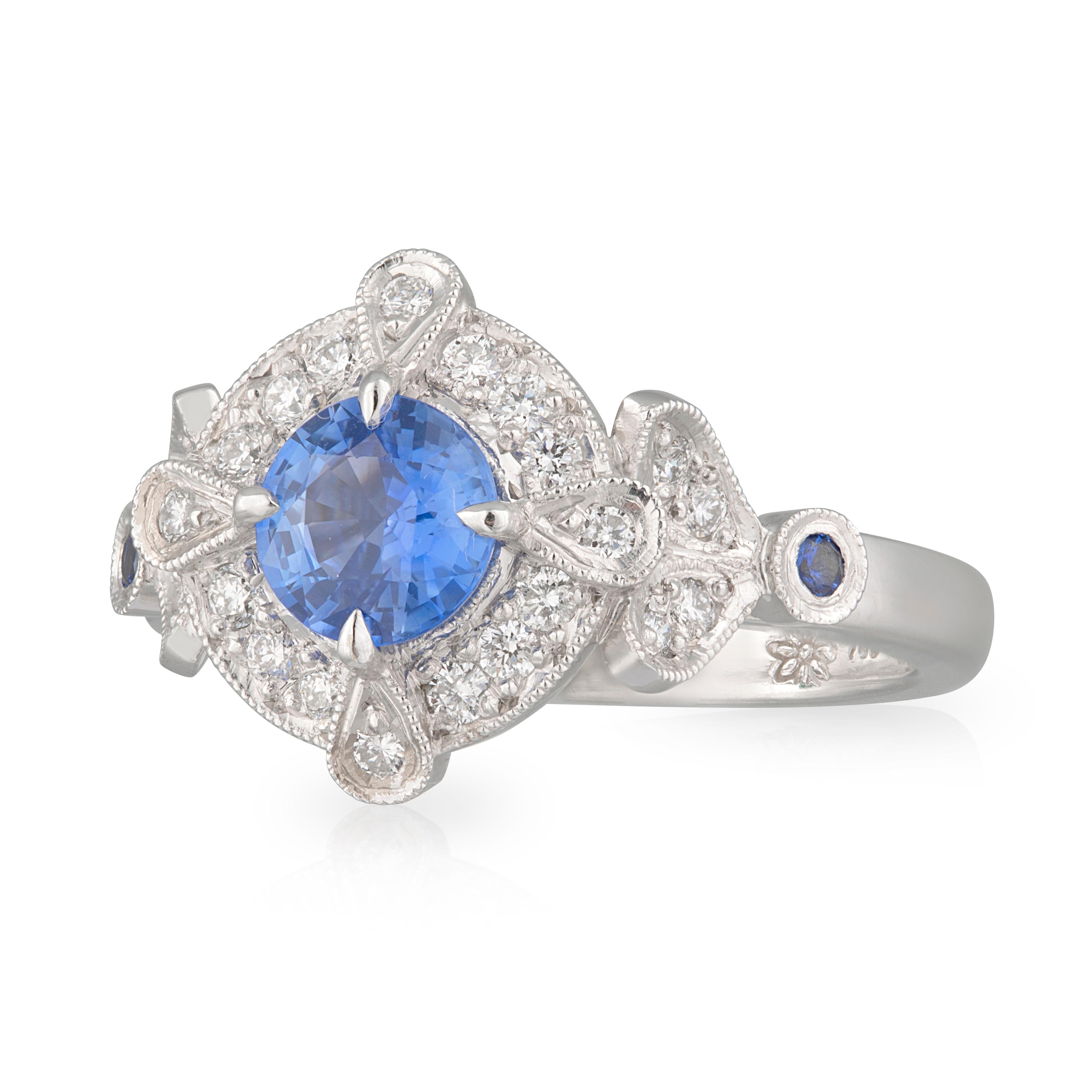 bespoke blue sapphire and diamond engagement ring