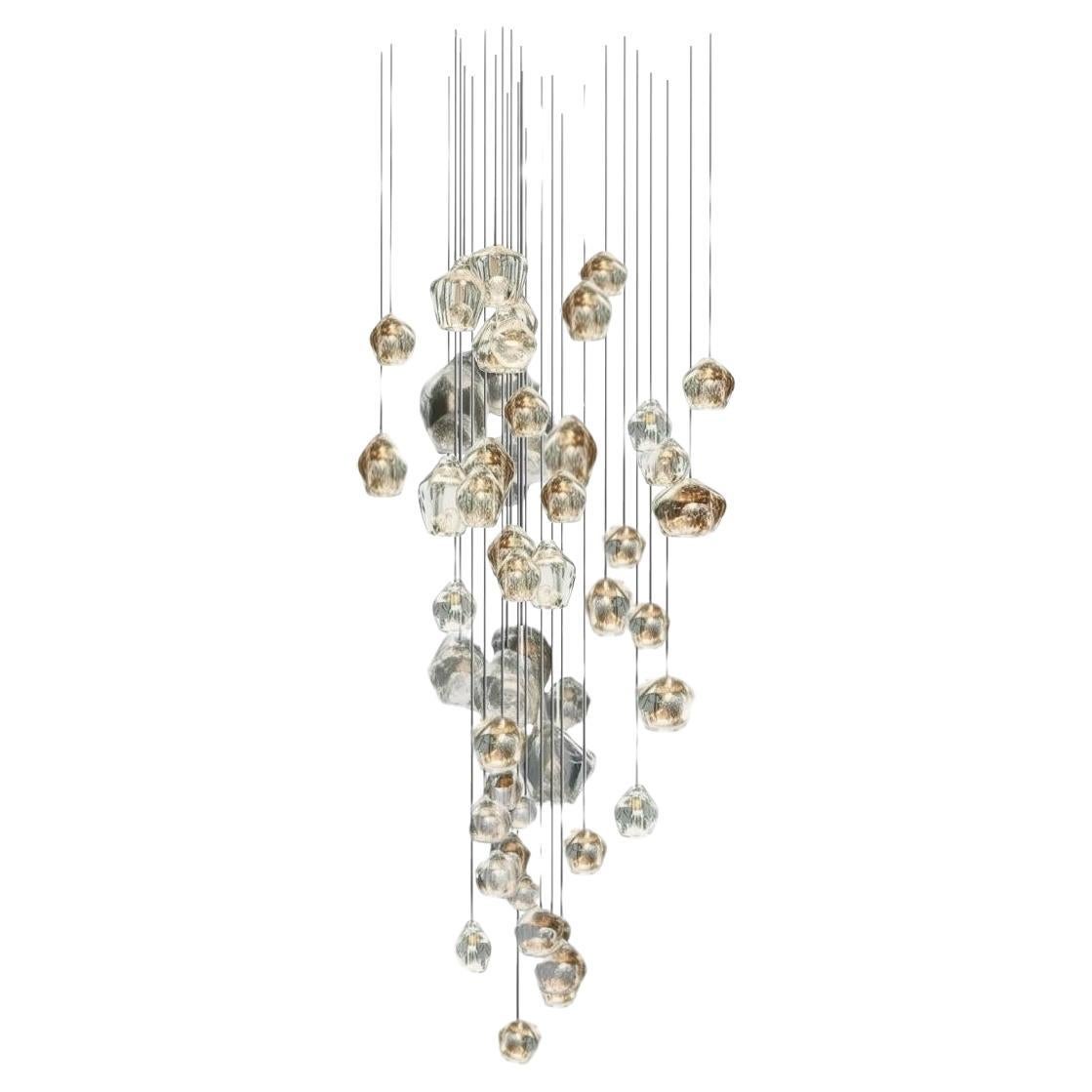 Handmade chandelier with glass blown elements with light elements