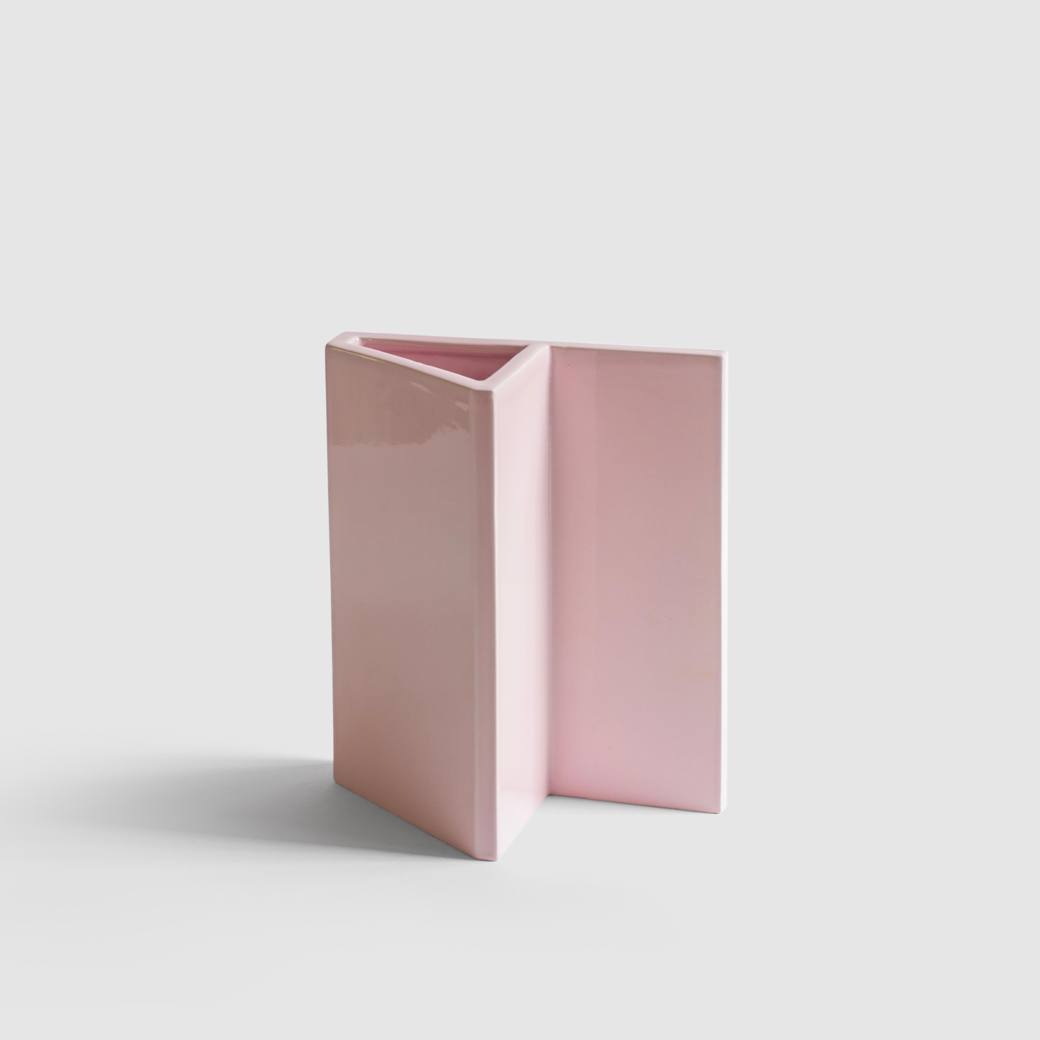 A minimalist and playful vase in slip-cast ceramic with a pink glaze, the piece is handmade in Milan.
Part of the 