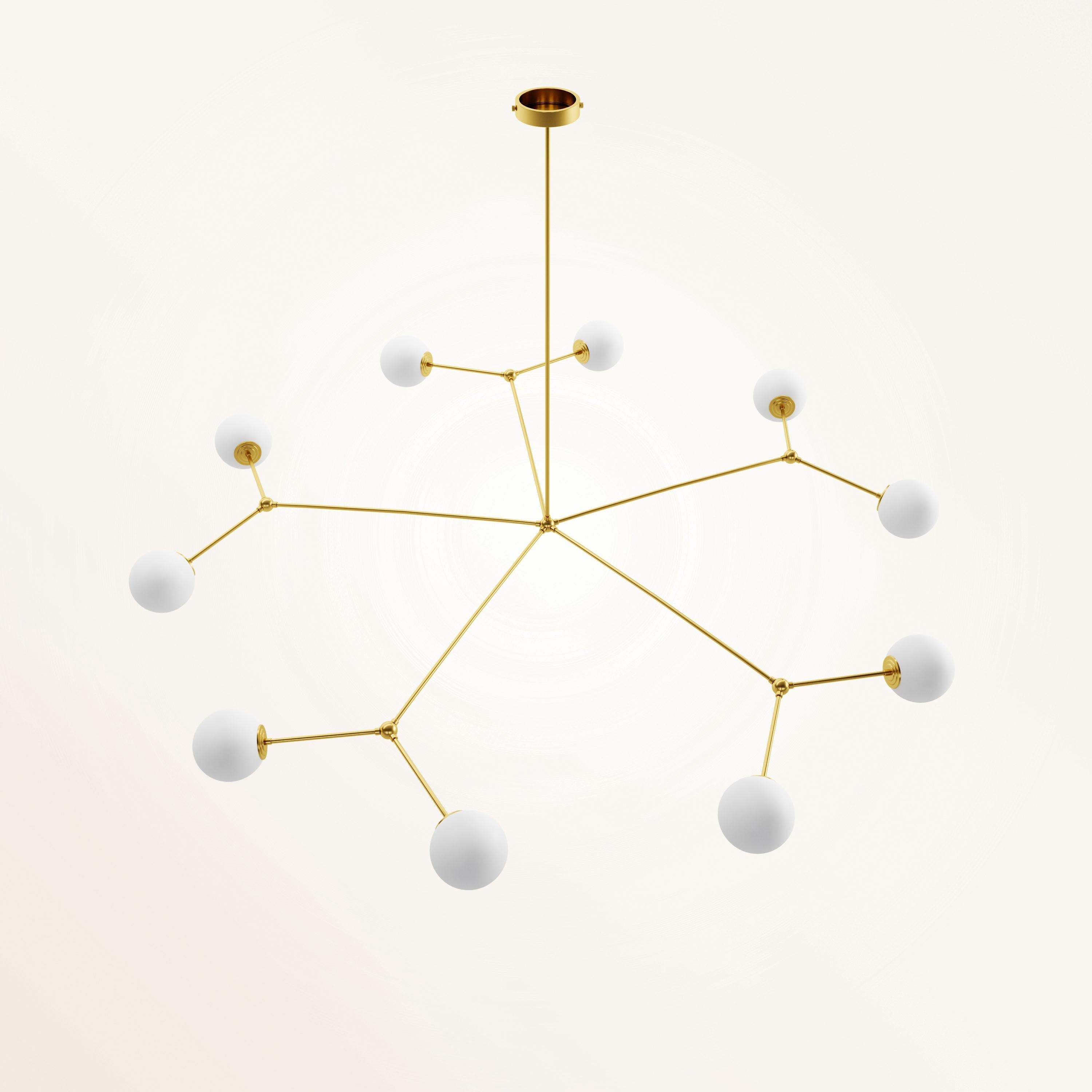 Handmade Chione II Chandelier by Gobo Lights
Dimensions: D 160 x W 160 x H 100 cm
Materials: Brass, opaline.

Chione is a goddess, daughter of Boreas. She is associated to the winter.

Self-taught and from the world of chemistry, this Belgian