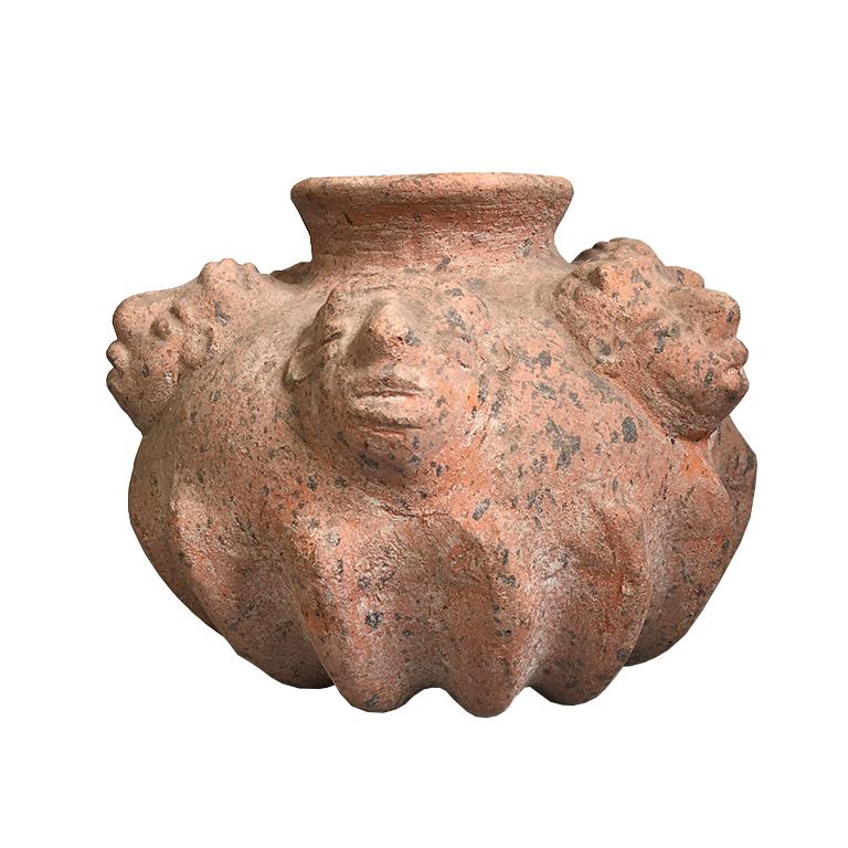 Beautiful handmade anthropomorphic terracotta or red clay six faces pottery vase. Pre Columbian terracotta vase surrounded by perpetual faces. Jug or vase, of primitive Bohemian style.
Wonderful piece to add layers to a coffee table, mantel, foyer