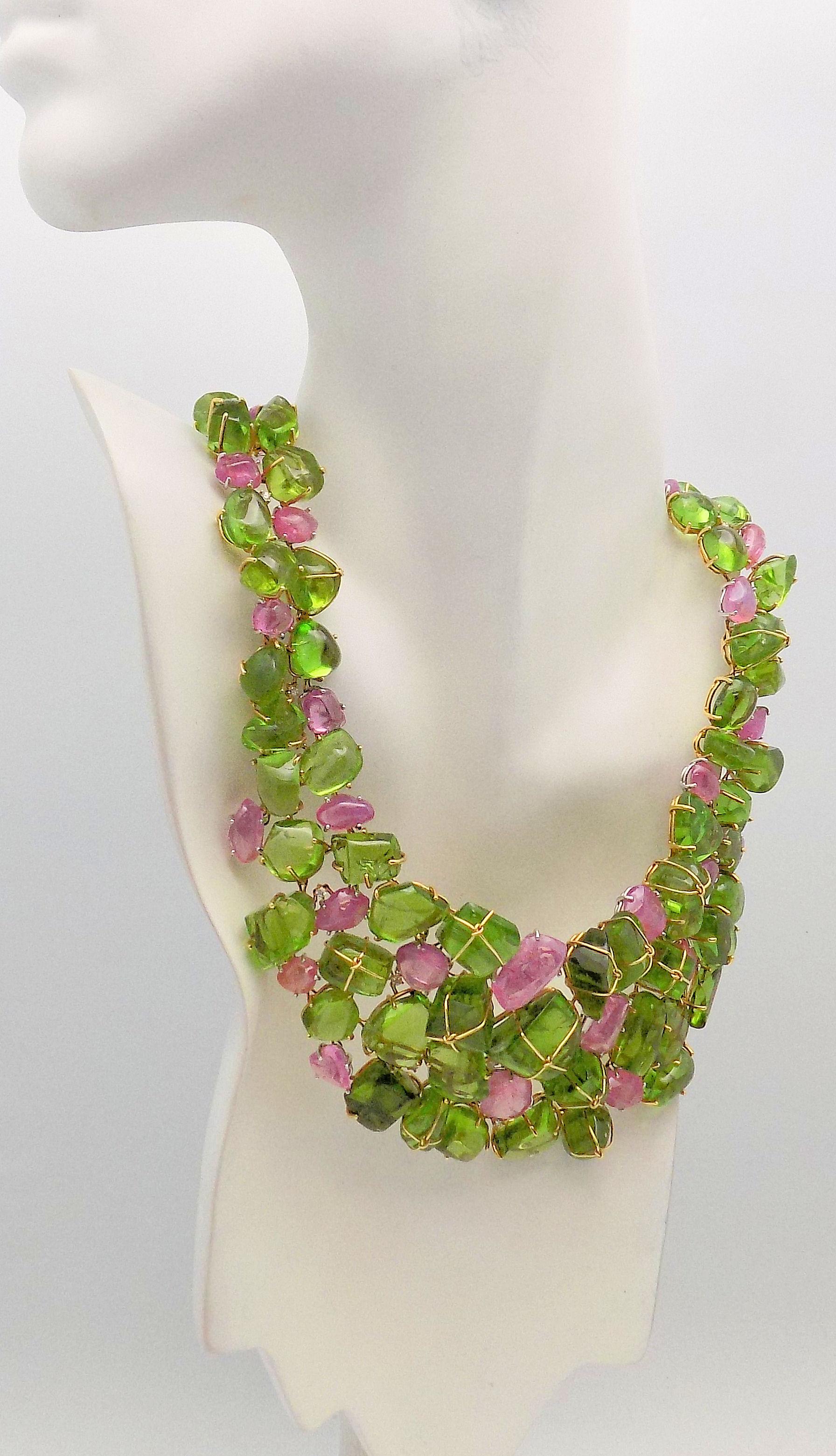 Dramatic Platinum and 18 Karat Yellow Gold Handmade Collar Style Necklace Set with Cabochon Peridots 766.90 Carat Total Weight, Cabochon Pink Sapphires 162.46 Carat Total Weight; Ruby 12.81 Carat; 18 Round Diamonds 0.75 Carat Total Weight, VS-2,