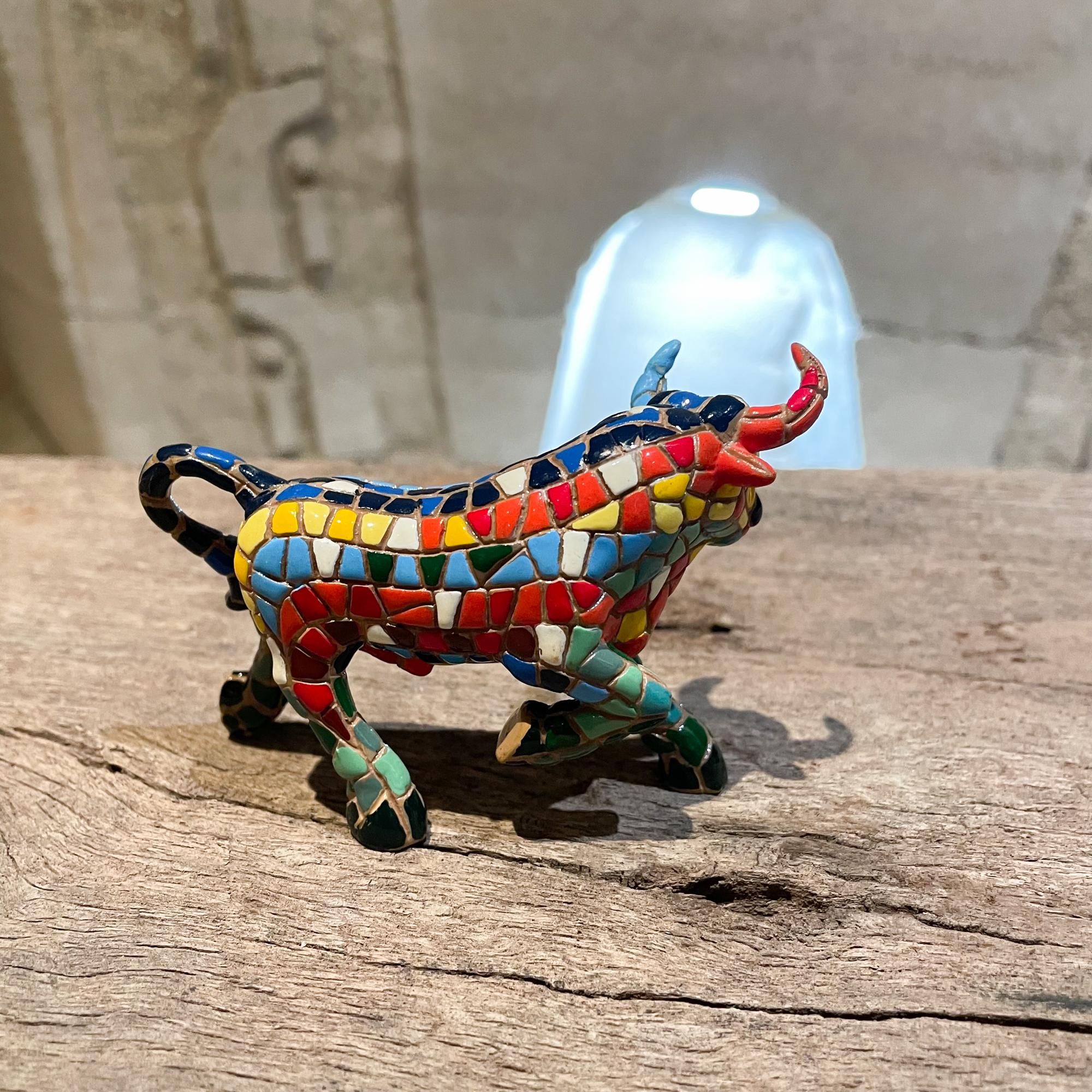 Handmade Tile Bull TORO Figurine Sculpture
Unmarked.
In the style of Mexican artist Genaro Alvarez.
Mosaic bull is handcrafted with a rainbow of colorful ceramic tiles.
2.5 H x 4 L x 1 D
Preowned Unrestored Good Vintage Condition 
Refer to our