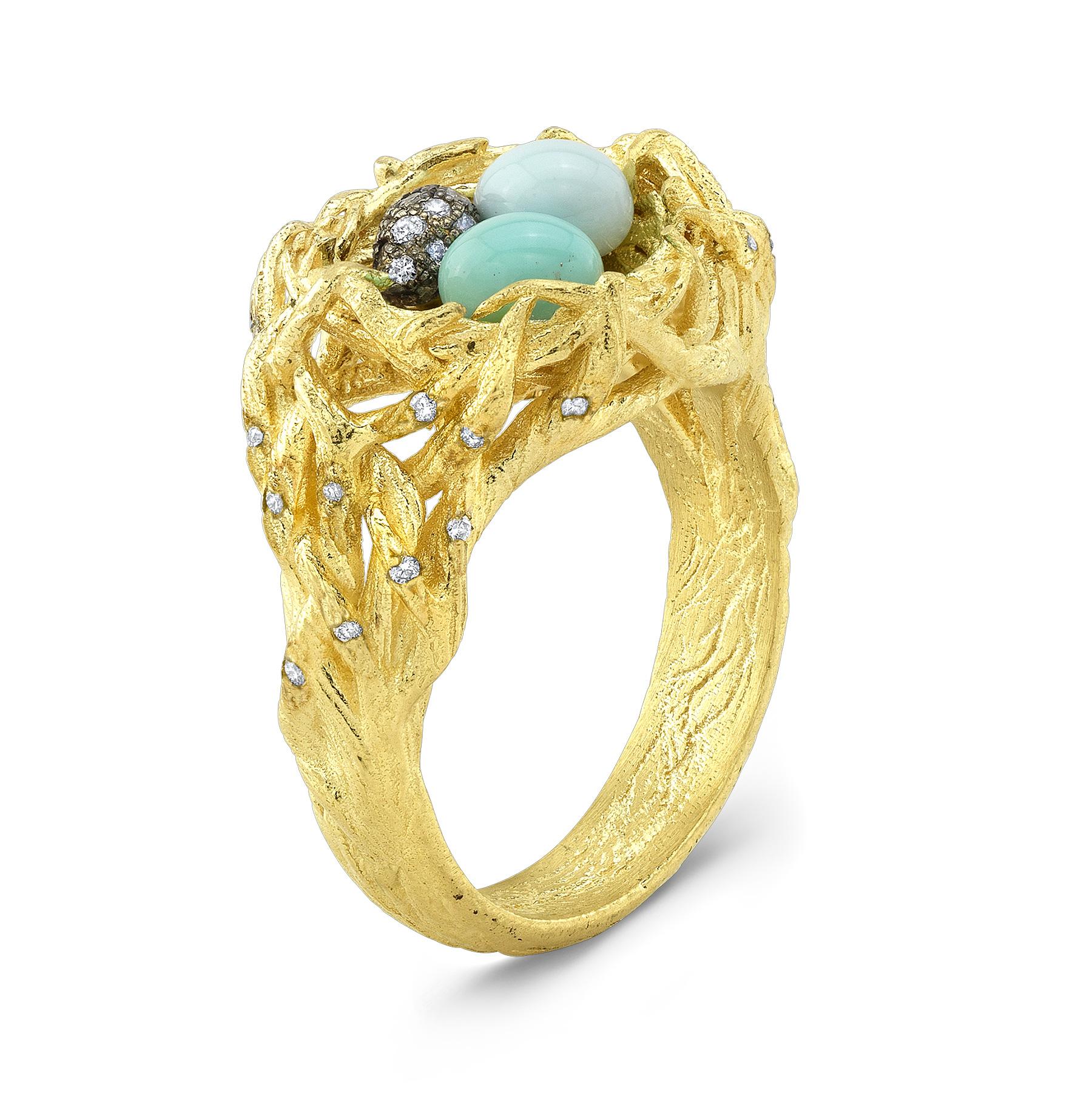Amy Y's 18K gold, diamond, and enamel Robin's Bird Nest Ring is a classic one-of-a-kind jewel.  Finding new ways to capture the wonders of the natural world of wild animals, Amy has worked to design an exquisite nest recreated in carved gold,
