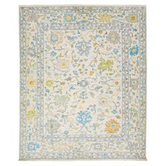 Tapis contemporain en laine beige à motif floral, fait main, style Oushak