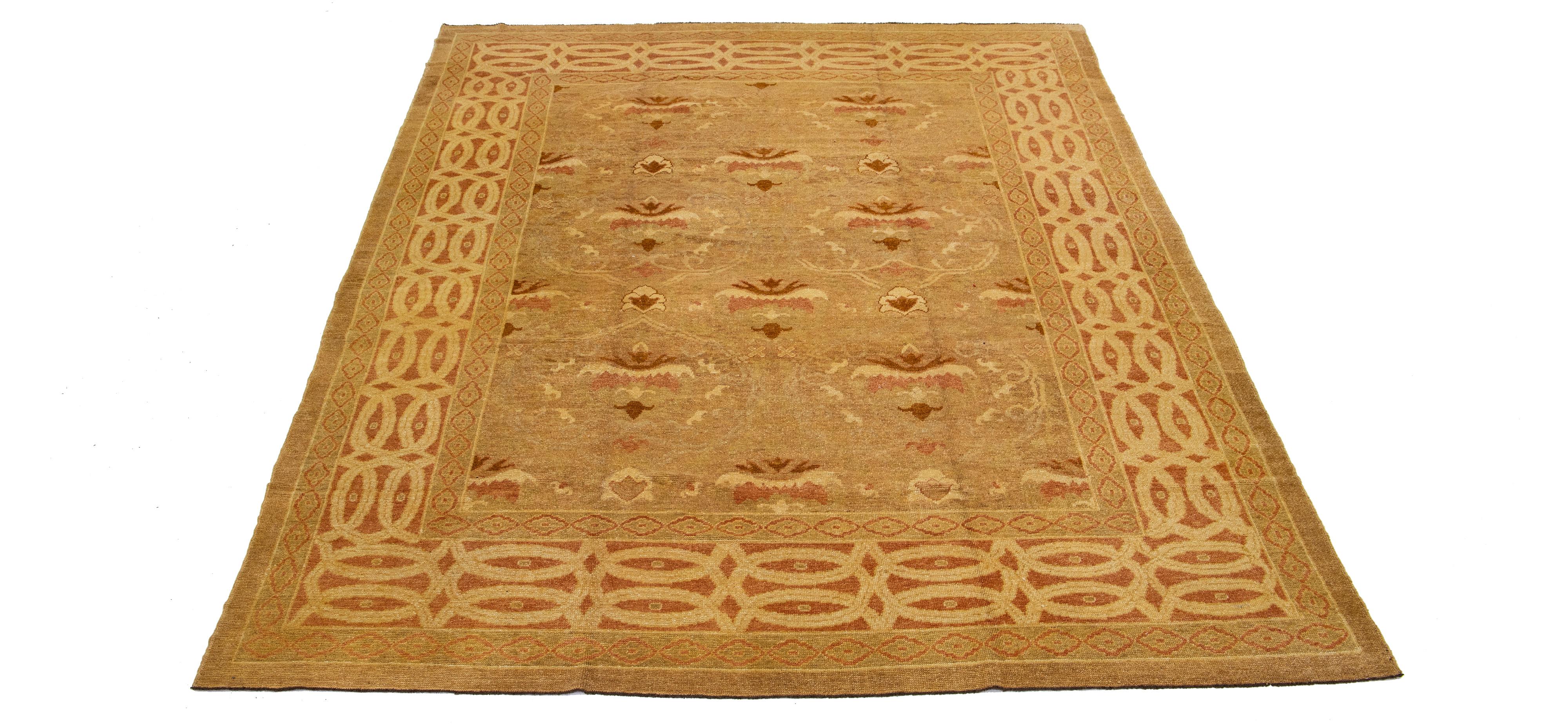 This antique Style Turkish wool rug features a charming tan color base and is hand-knotted with utmost attention to detail. With stunning peach and brown accents, it displays a captivating floral pattern that is alluring to any design.

This rug