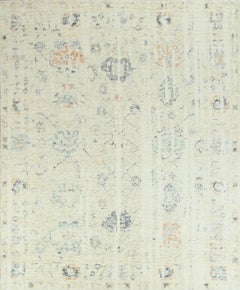 Handmade Contemporary Vintage-Style Wool Rug in Ivory, Subtle Multicolor Accents