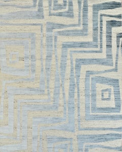 Tapis de laine contemporain fait main en beige et bleu-gris, motif géométrique abstrait