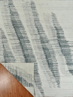 Handmade Contemporary Wool Rug in Ivory and Teal Blue with Abstract Wave Pattern