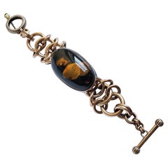 Bracelet en cuivre et chaîne d'ambre fait à la main, la résonance organique rencontre la grâce structurelle