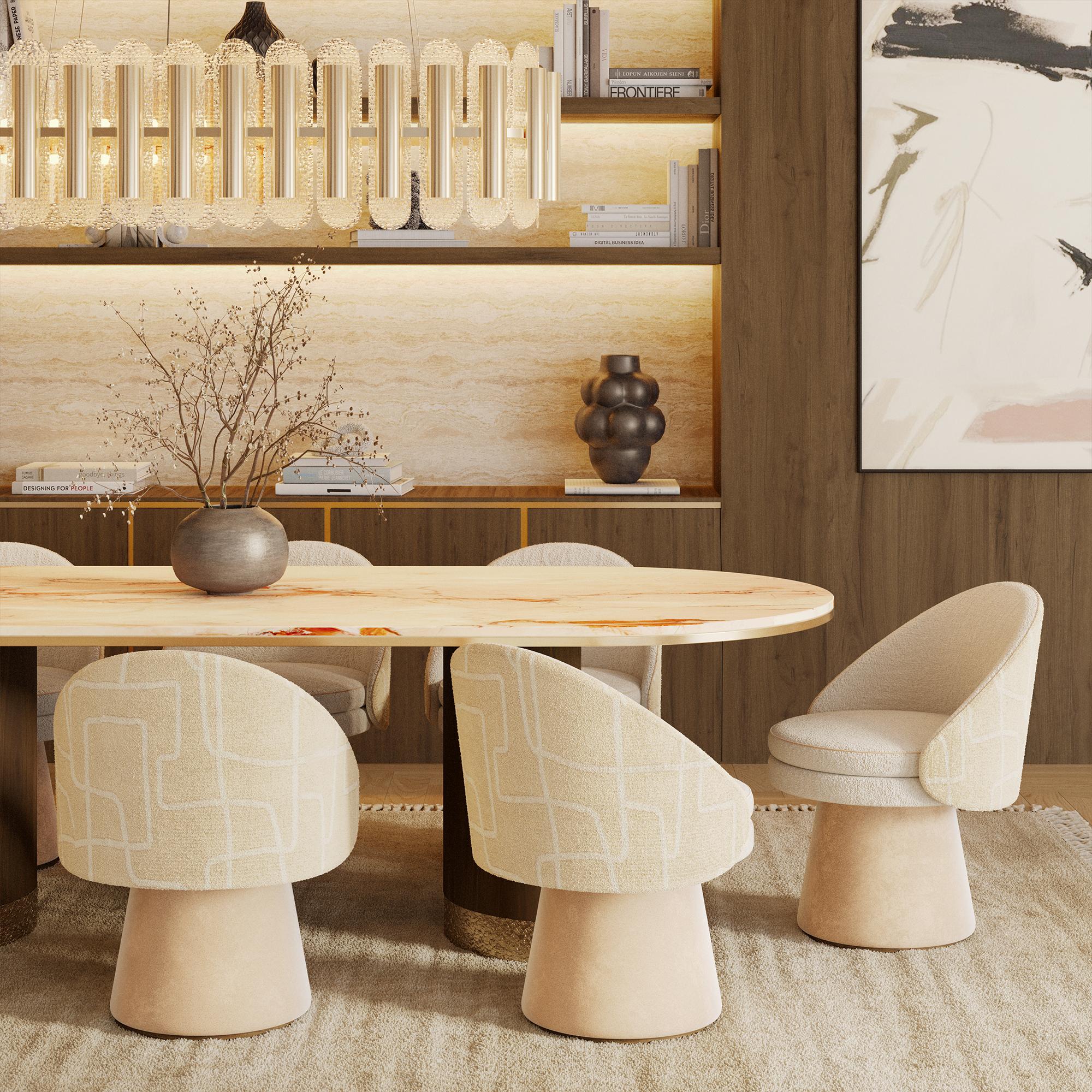 Mesa de comedor Coralie de Nolita Harbour. Este lujoso mueble de comedor presenta una impresionante encimera de mármol Rosa Egeo, con delicados tonos cálidos y vetas naturales, que crean un cautivador punto focal para cualquier comedor. Las robustas