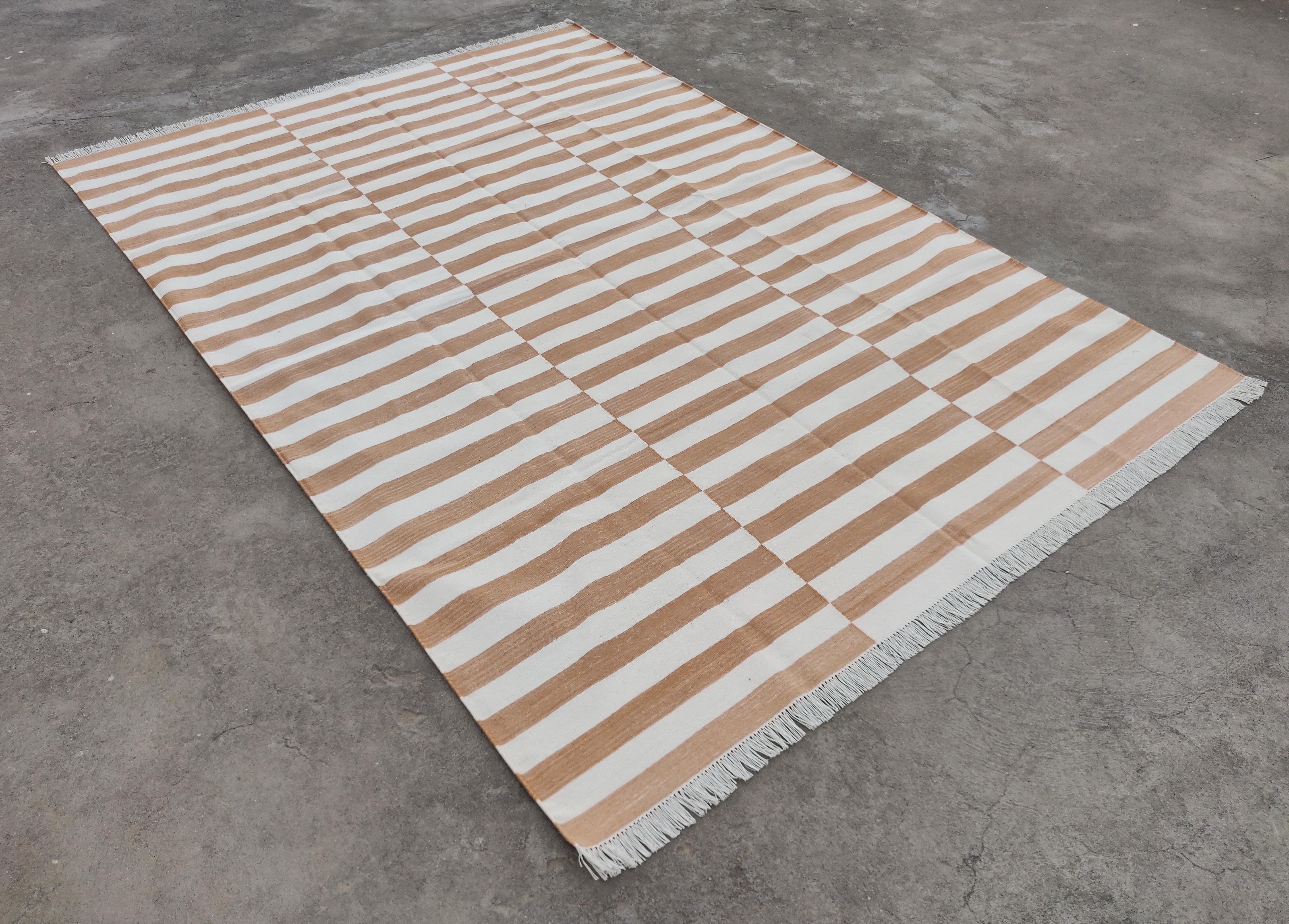 Cotton Natural Vegetable Dyed, Tan And White Striped Indian Rug - 
Size 12'x15' (360x450cm)
These special flat-weave dhurries are hand-woven with 15 ply 100% cotton yarn. Due to the special manufacturing techniques used to create our rugs, the size