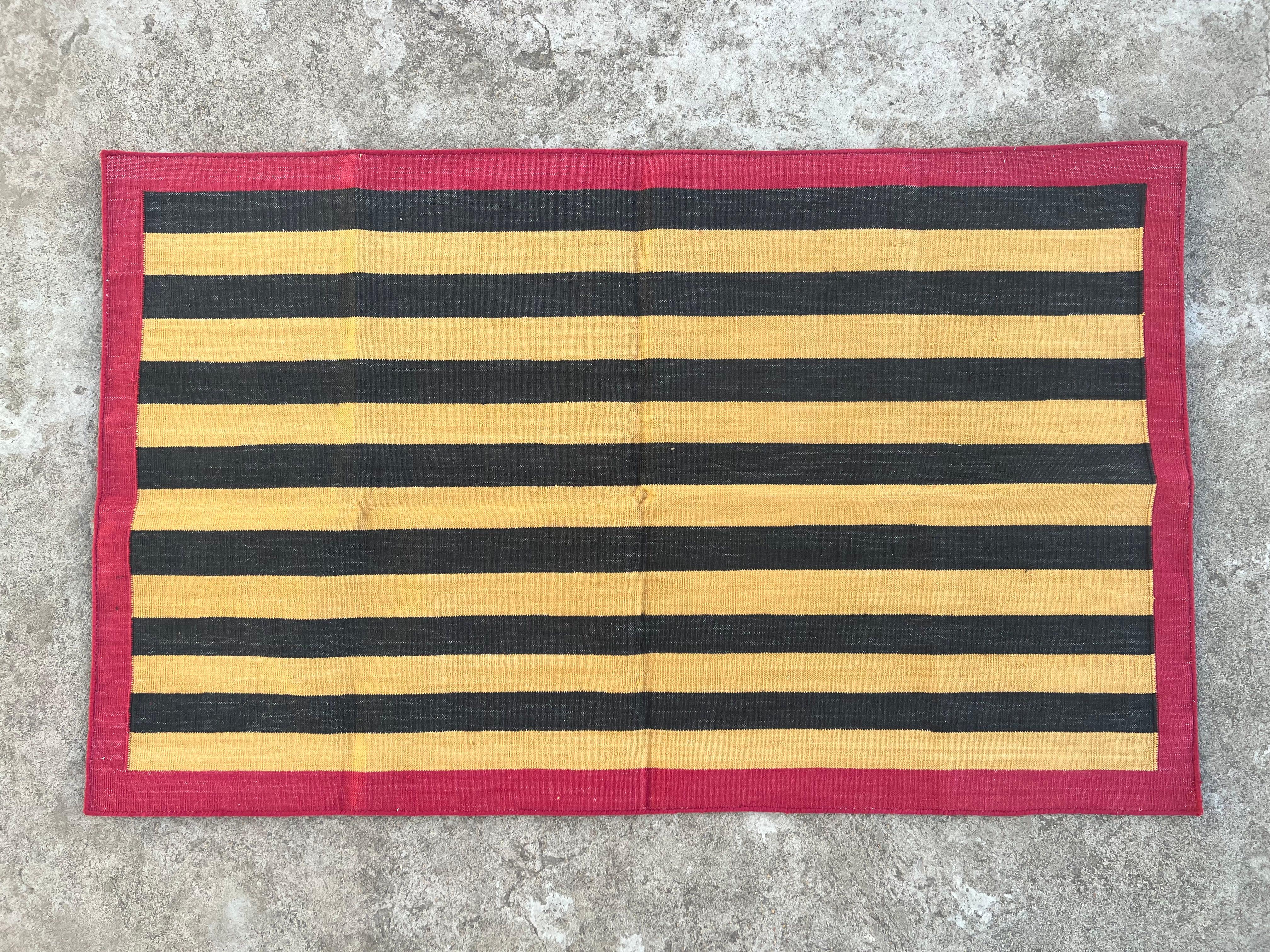 Handmade Cotton Area Flat Weave Rug, 2.5x4 Yellow, Black Striped Indian Dhurrie For Sale 1