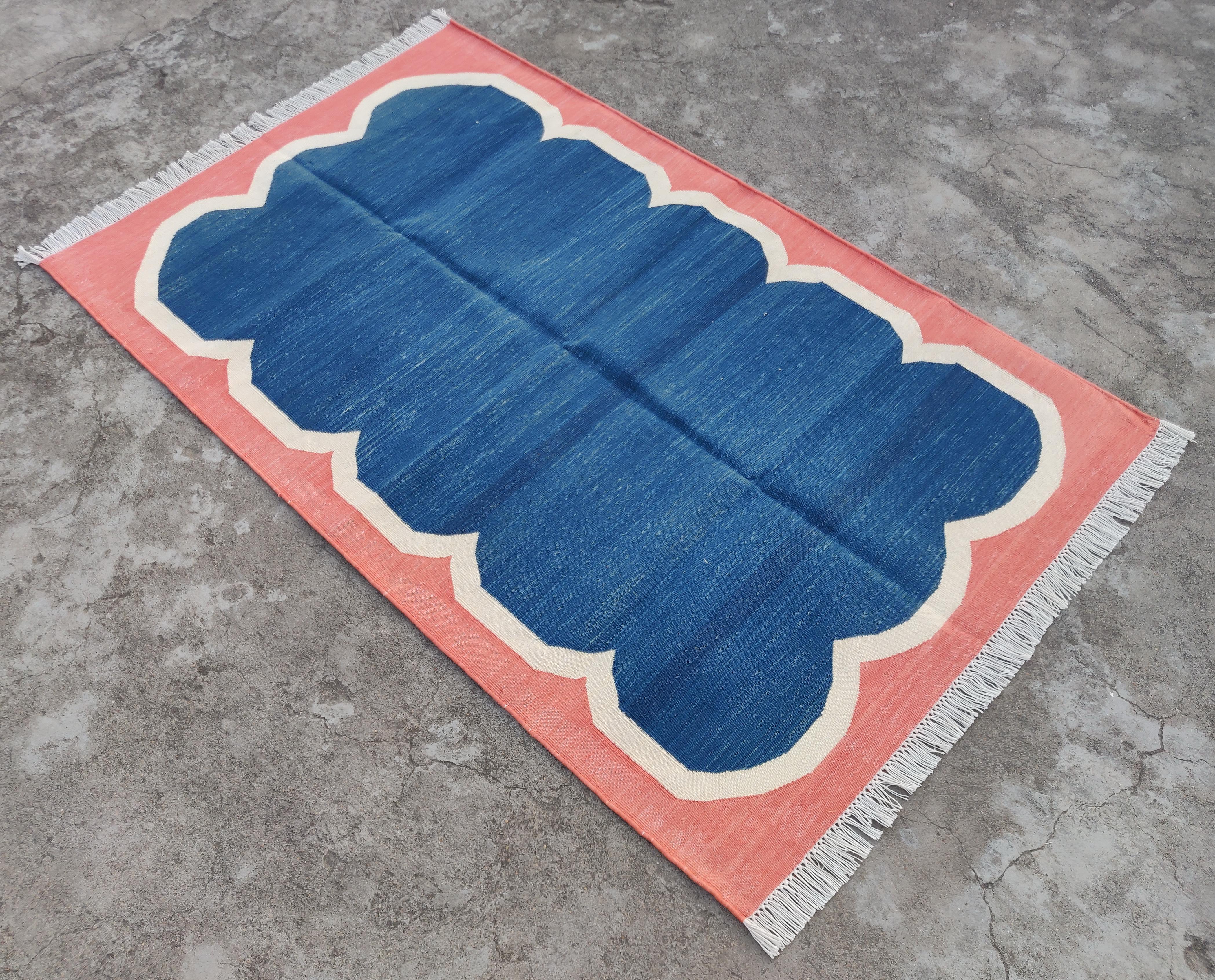 Cotton Vegetable Dyed Blue And Coral Scalloped Striped Indian Dhurrie Rug-3'x5' 
These special flat-weave dhurries are hand-woven with 15 ply 100% cotton yarn. Due to the special manufacturing techniques used to create our rugs, the size and color