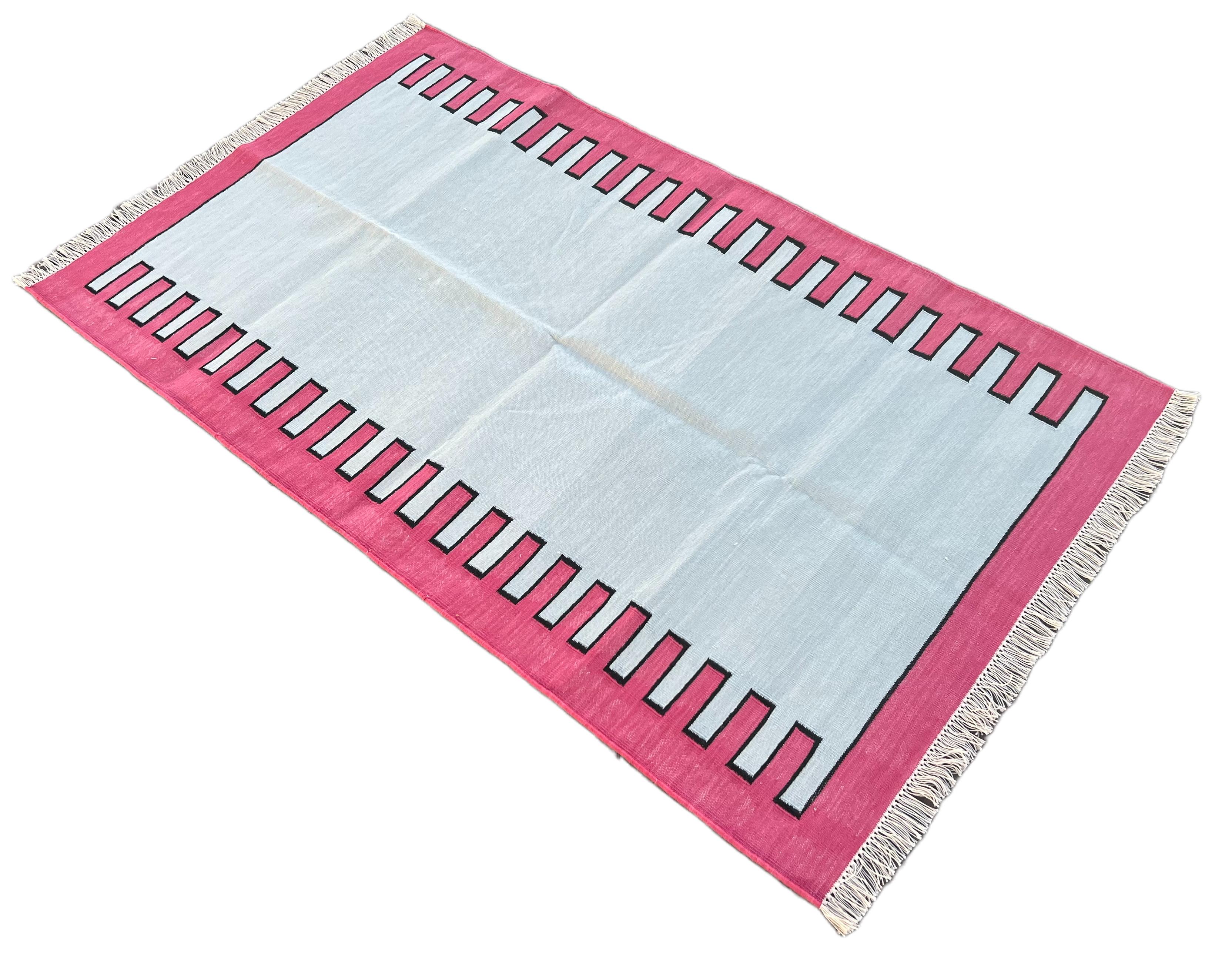 Cotton Vegetable Dyed Sky Blue And Pink Zig Zag Striped Indian Dhurrie Rug-3'x5' 
These special flat-weave dhurries are hand-woven with 15 ply 100% cotton yarn. Due to the special manufacturing techniques used to create our rugs, the size and color