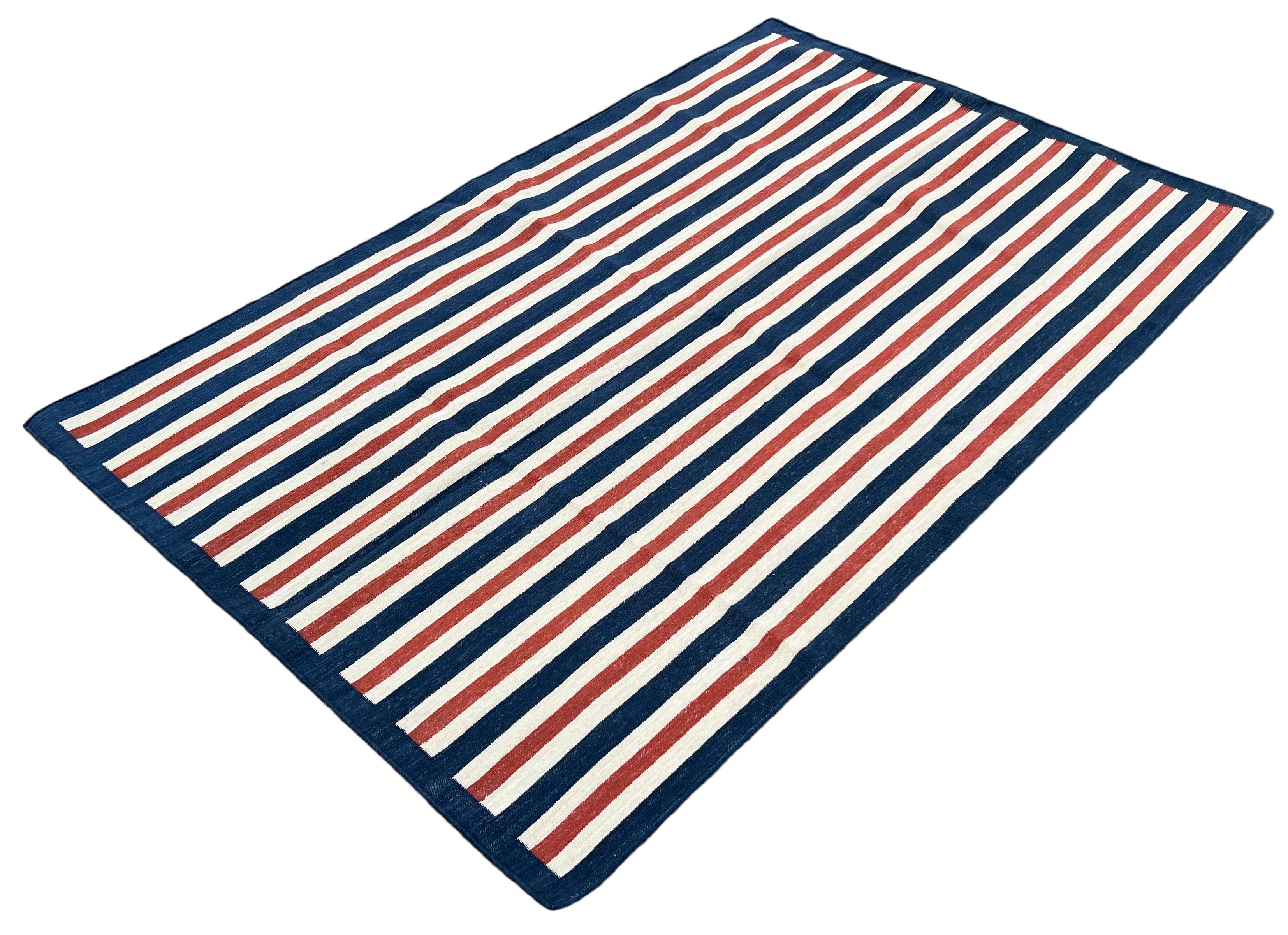 Cotton Vegetable Dyed Navy Blue, Cream And Red Striped Indian Dhurrie Rug-3'x5' 
These special flat-weave dhurries are hand-woven with 15 ply 100% cotton yarn. Due to the special manufacturing techniques used to create our rugs, the size and color