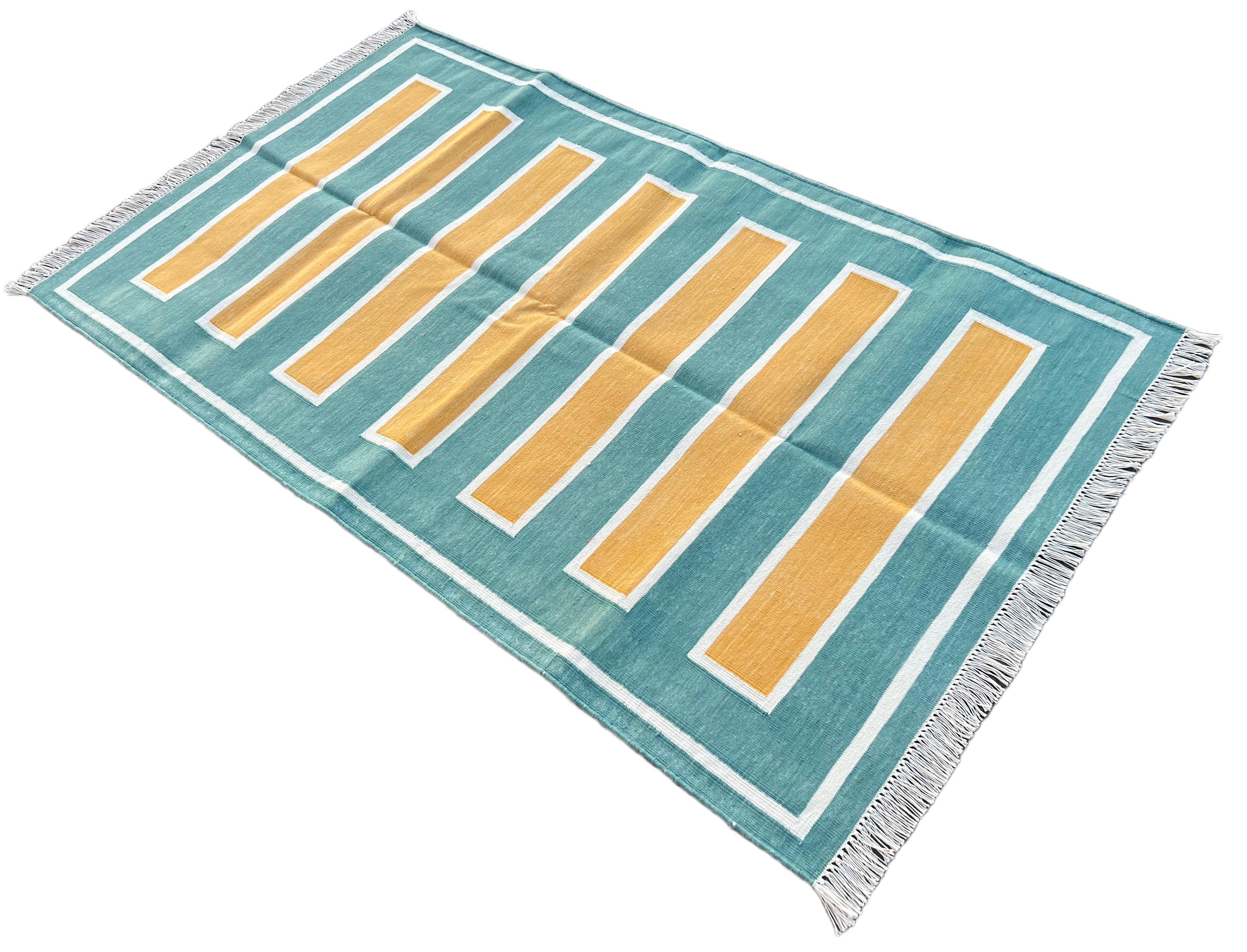 Baumwolle pflanzlich gefärbt Reversible Grün und Gelb Windowpane indischen karierten Teppich - 3'x5'
Diese speziellen flachgewebten Dhurries werden aus 15-fachem Garn aus 100% Baumwolle handgewebt. Aufgrund der speziellen Fertigungstechniken, die