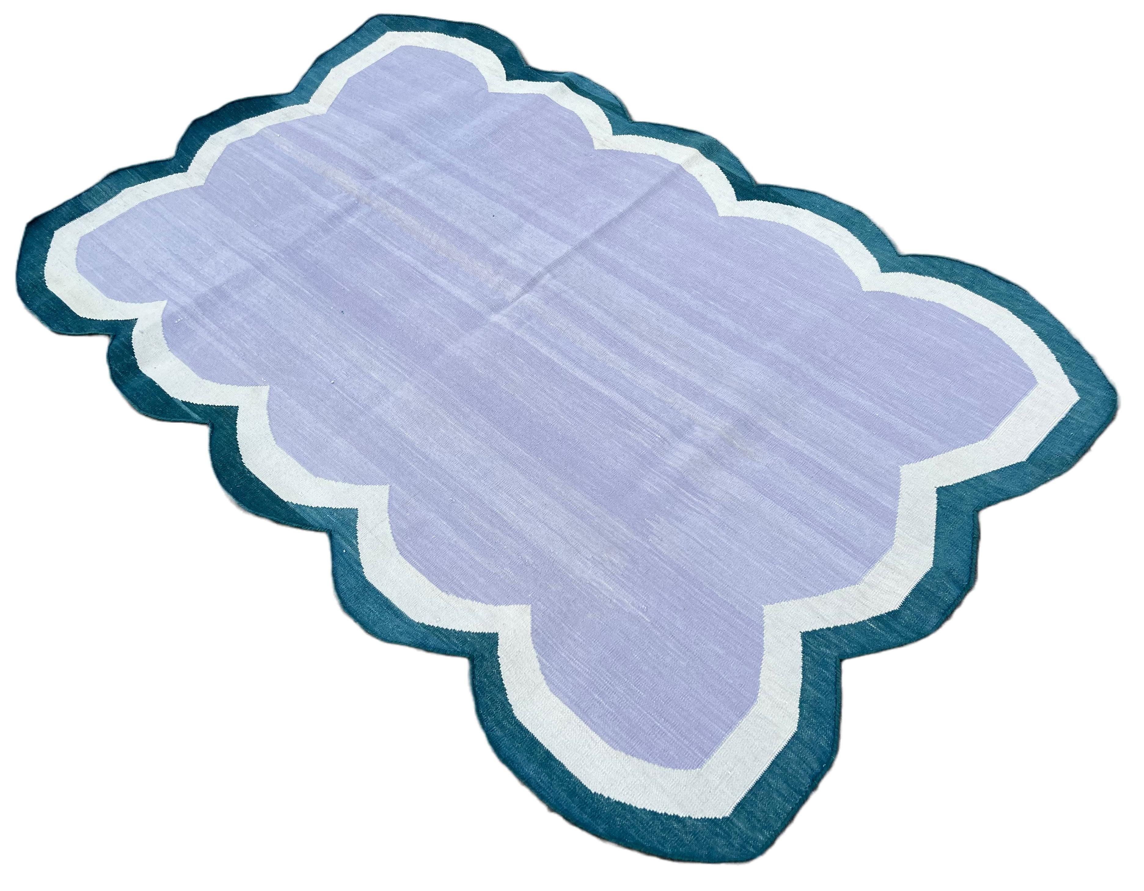 Cotton Vegetable Dyed Lavender, Cream And Teal Blue Four Sided Scalloped Rug-3'x5' 
(Scallops runs on all Four Sides)
These special flat-weave dhurries are hand-woven with 15 ply 100% cotton yarn. Due to the special manufacturing techniques used to