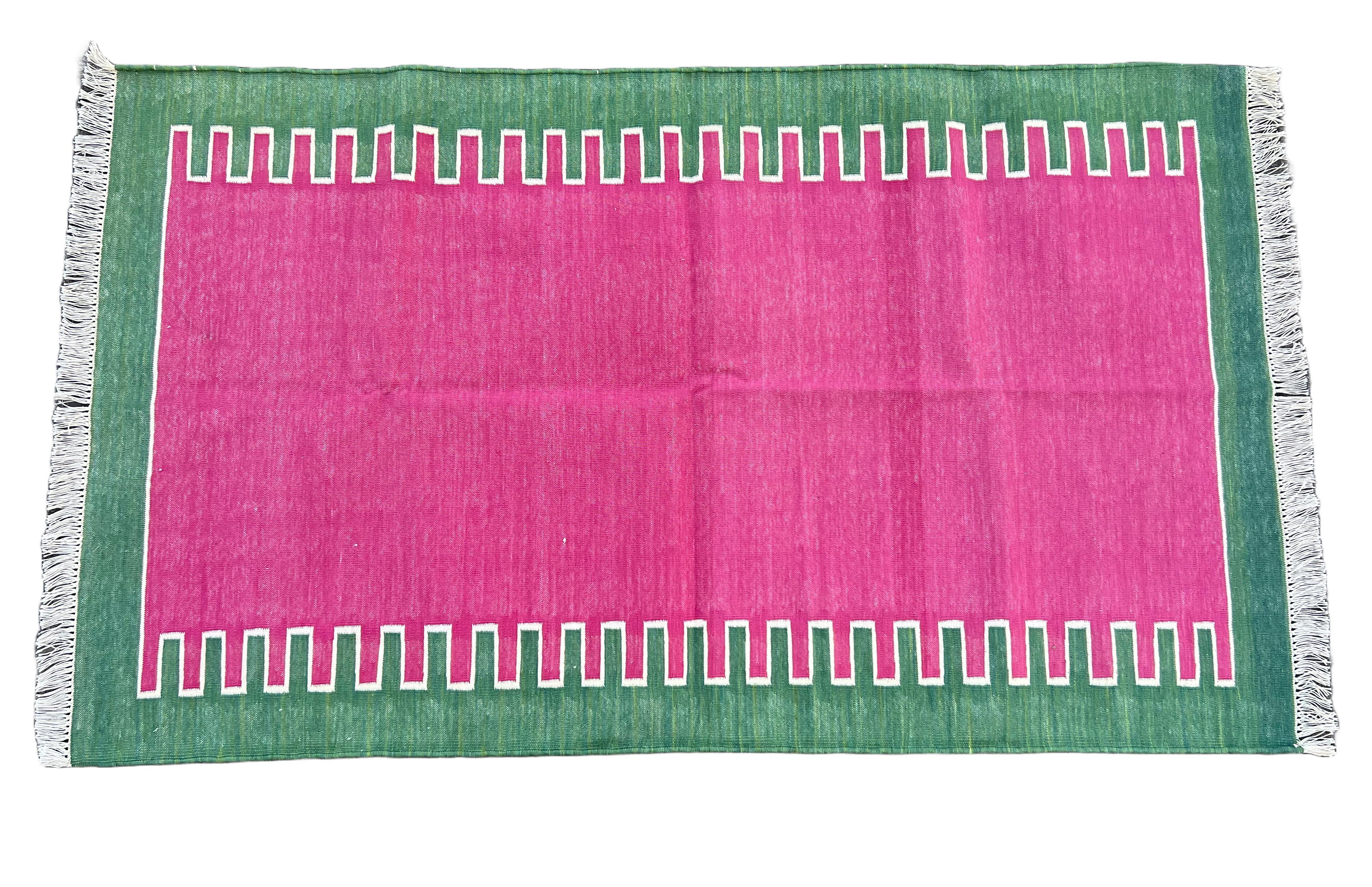 Cotton Vegetable Dyed Raspberry Pink, Cream And Forest Green Zig Zag Striped Indian Dhurrie Rug-3'x5' (90x150cm) 

These special flat-weave dhurries are hand-woven with 15 ply 100% cotton yarn. Due to the special manufacturing techniques used to