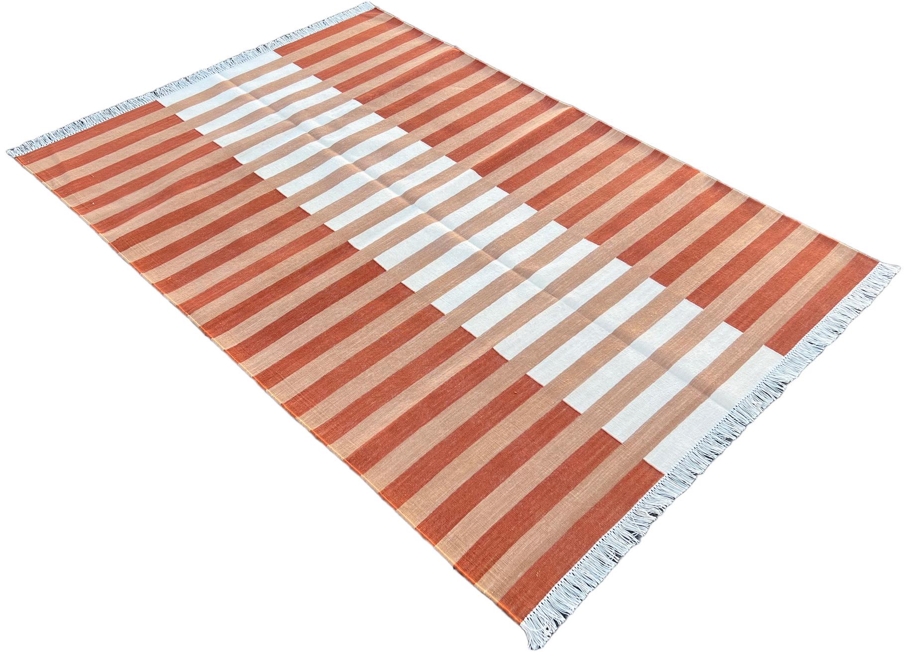 Cotton Vegetable Dyed Tan, Cream And Beige Striped Indian Dhurrie Rug-4'x6' 
These special flat-weave dhurries are hand-woven with 15 ply 100% cotton yarn. Due to the special manufacturing techniques used to create our rugs, the size and color of