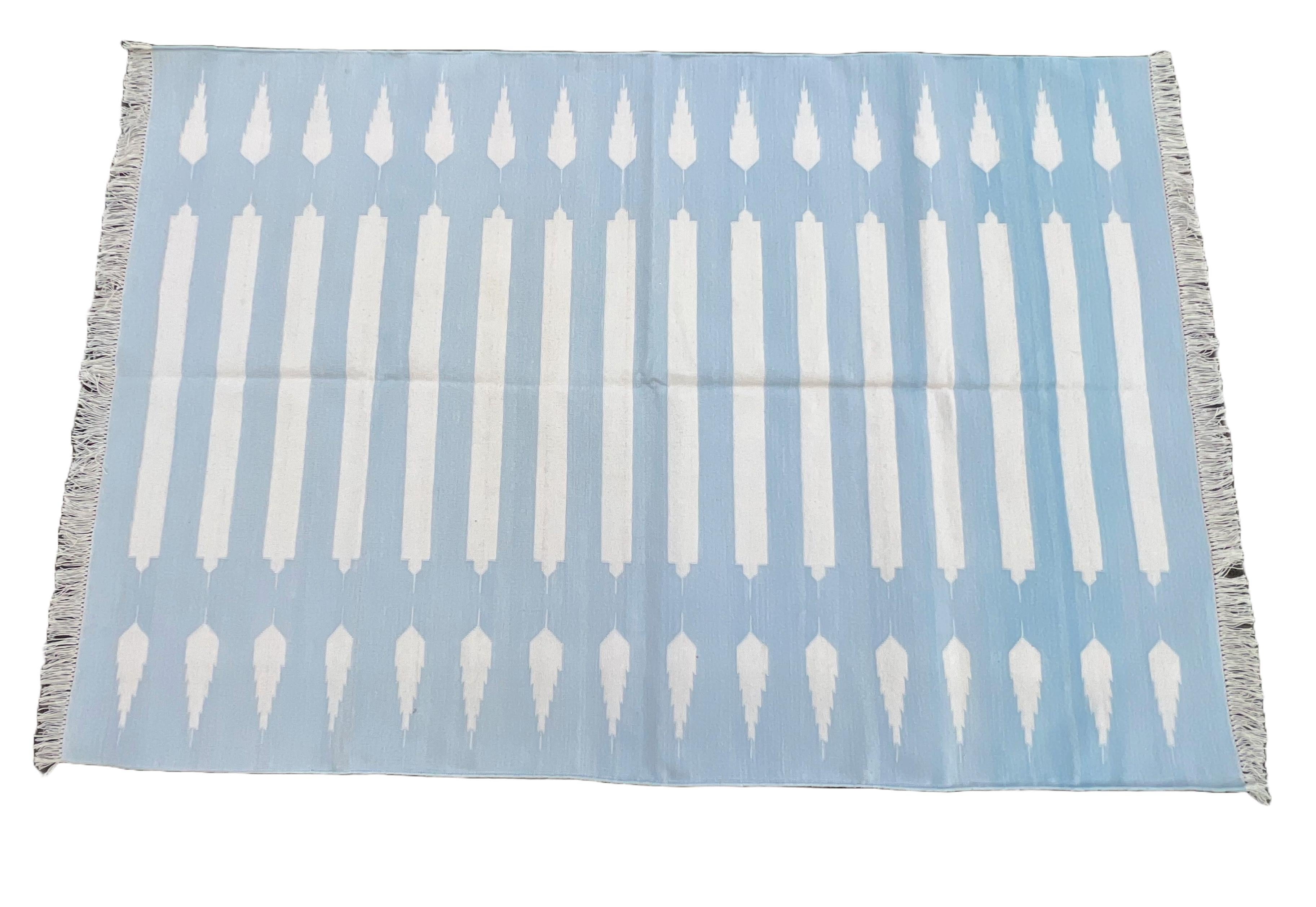 Cotton Natural Vegetable Dyed Sky Blue And White Striped Indian Rug-4'x6'

These special flat-weave dhurries are hand-woven with 15 ply 100% cotton yarn. Due to the special manufacturing techniques used to create our rugs, the size and color of each