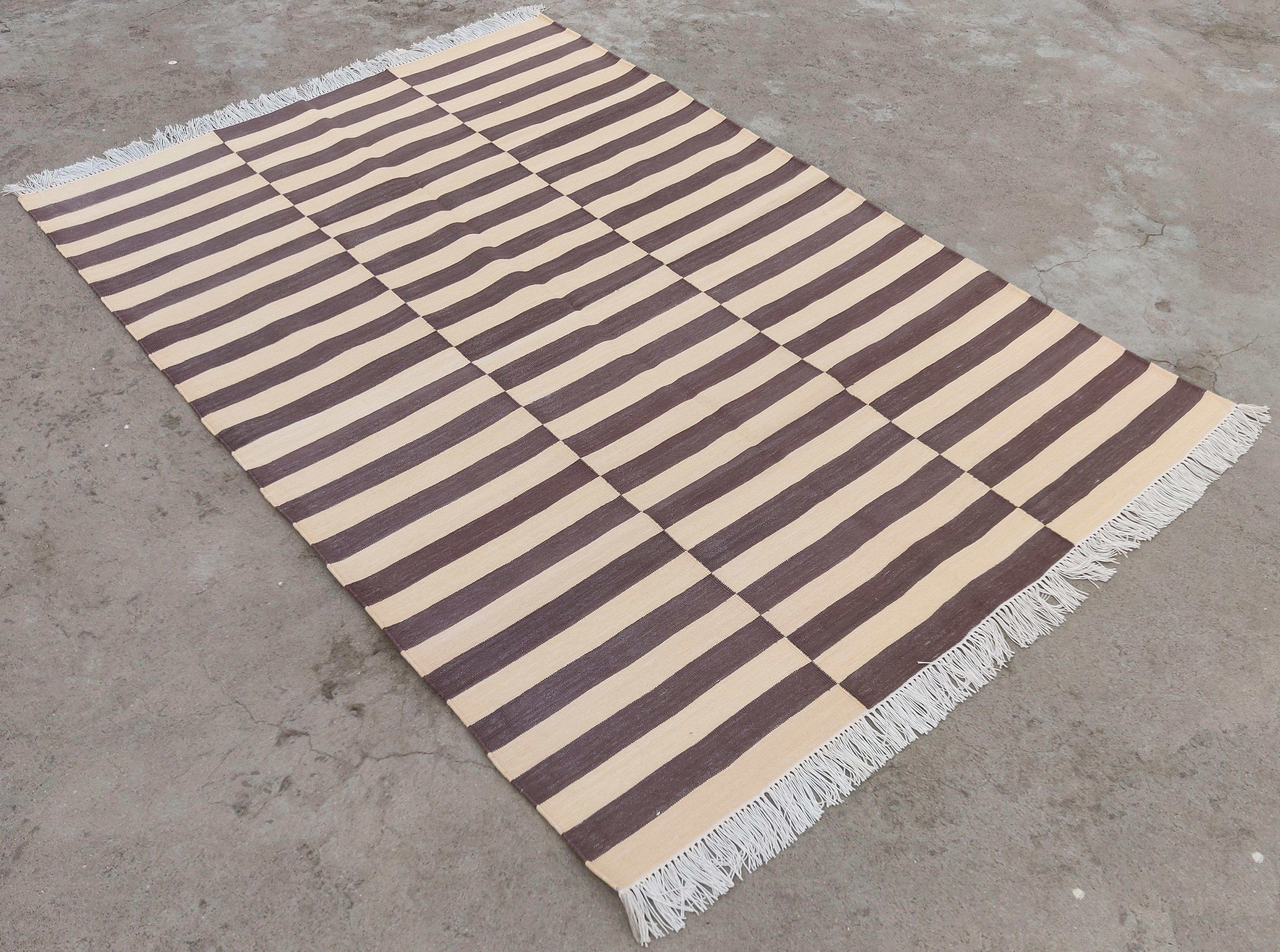 Cotton Vegetable Dyed Cream And Brown Striped Indian Dhurrie Rug-4'x6' 
These special flat-weave dhurries are hand-woven with 15 ply 100% cotton yarn. Due to the special manufacturing techniques used to create our rugs, the size and color of each
