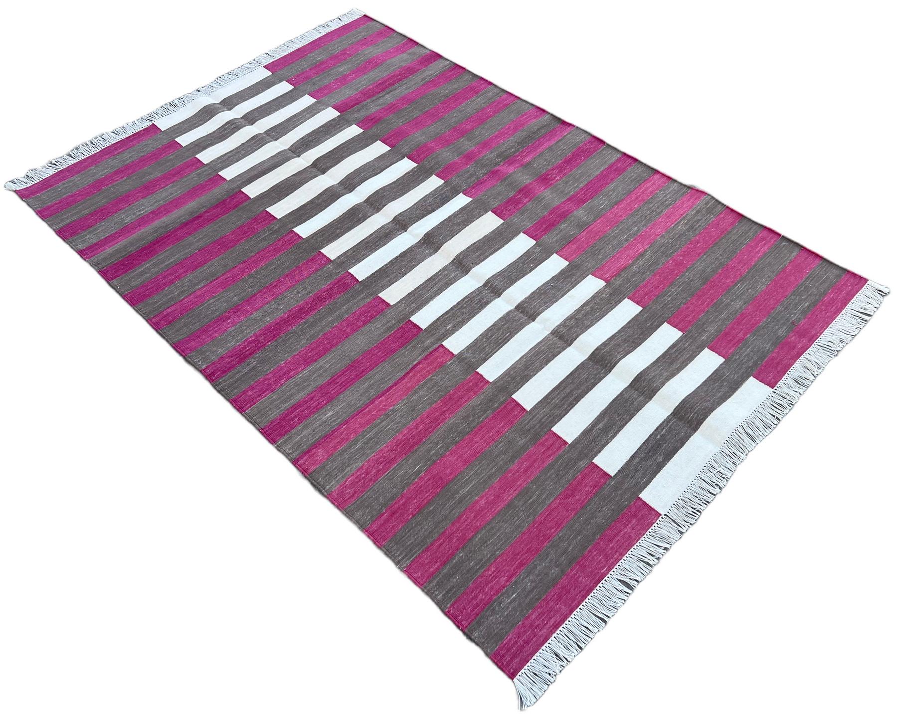 Cotton Vegetable Dyed Brown , Cream And Raspberry Pink Striped Indian Dhurrie Rug-4'x6' 
These special flat-weave dhurries are hand-woven with 15 ply 100% cotton yarn. Due to the special manufacturing techniques used to create our rugs, the size and