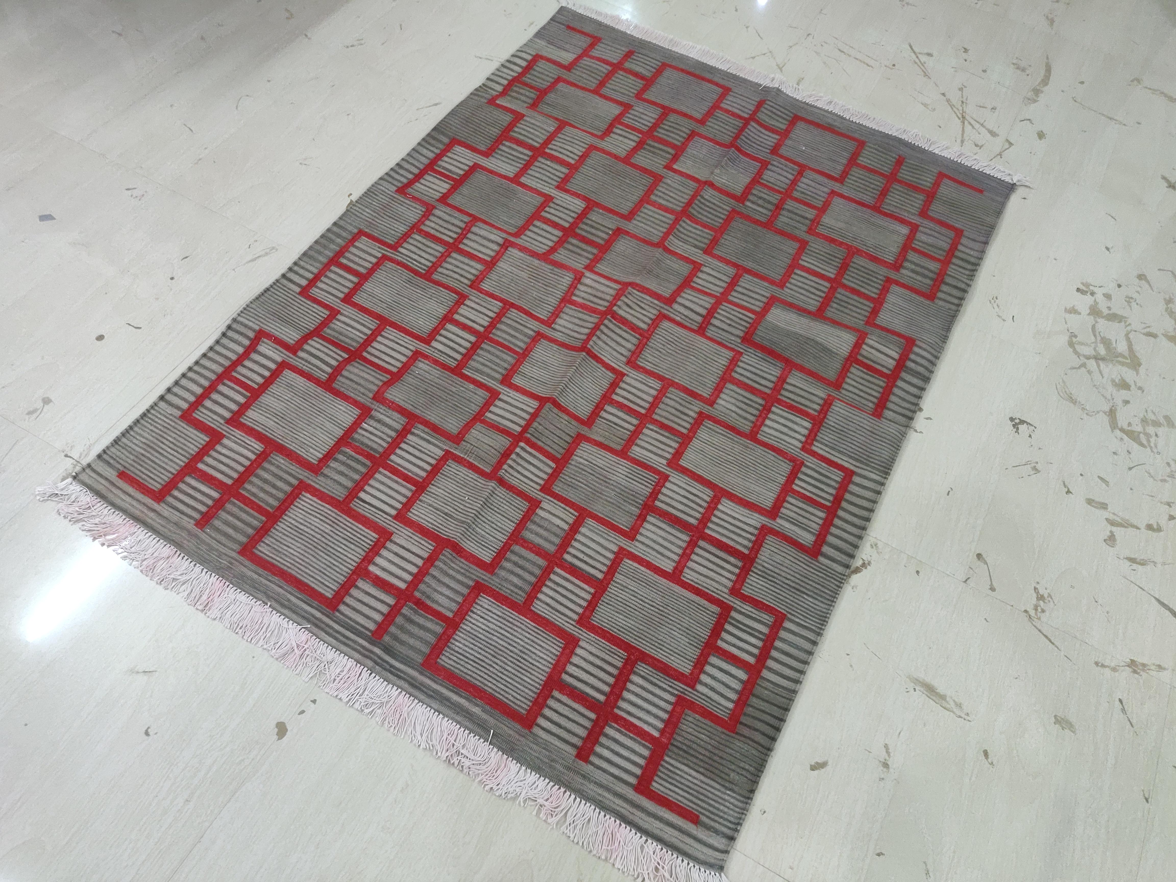 Cotton Vegetable Dyed Brown And Red Geometric Indian Dhurrie Rug-4'x6' 

These special flat-weave dhurries are hand-woven with 15 ply 100% cotton yarn. Due to the special manufacturing techniques used to create our rugs, the size and color of each