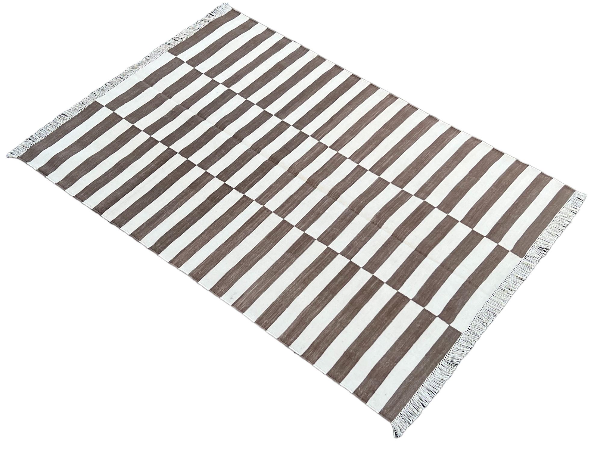 Cotton Vegetable Dyed Brown And White Striped Indian Dhurrie Rug-4'x6' 
These special flat-weave dhurries are hand-woven with 15 ply 100% cotton yarn. Due to the special manufacturing techniques used to create our rugs, the size and color of each