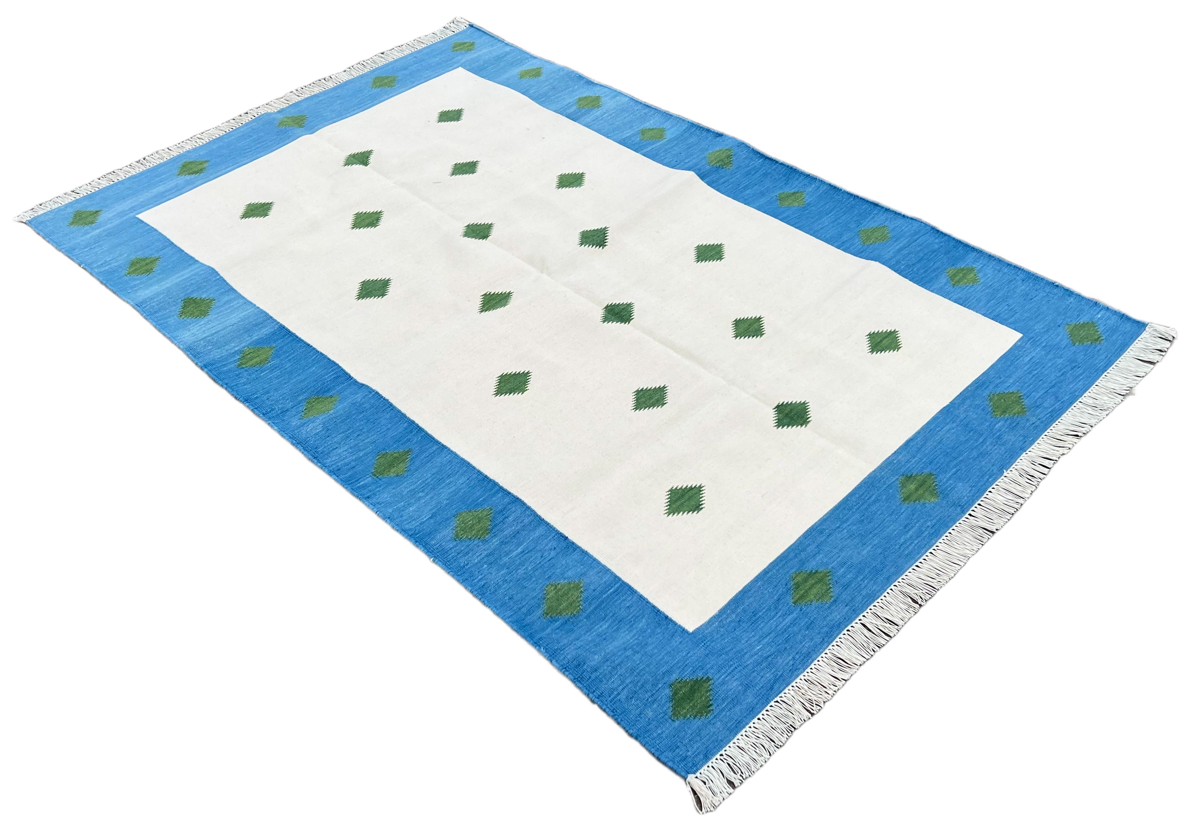 Handmade Cotton Natural Vegetable Dyed Rug, Cream, Green And Blue Diamond Indian Dhurrie- 4'x6'
These special flat-weave dhurries are hand-woven with 15 ply 100% cotton yarn. Due to the special manufacturing techniques used to create our rugs, the