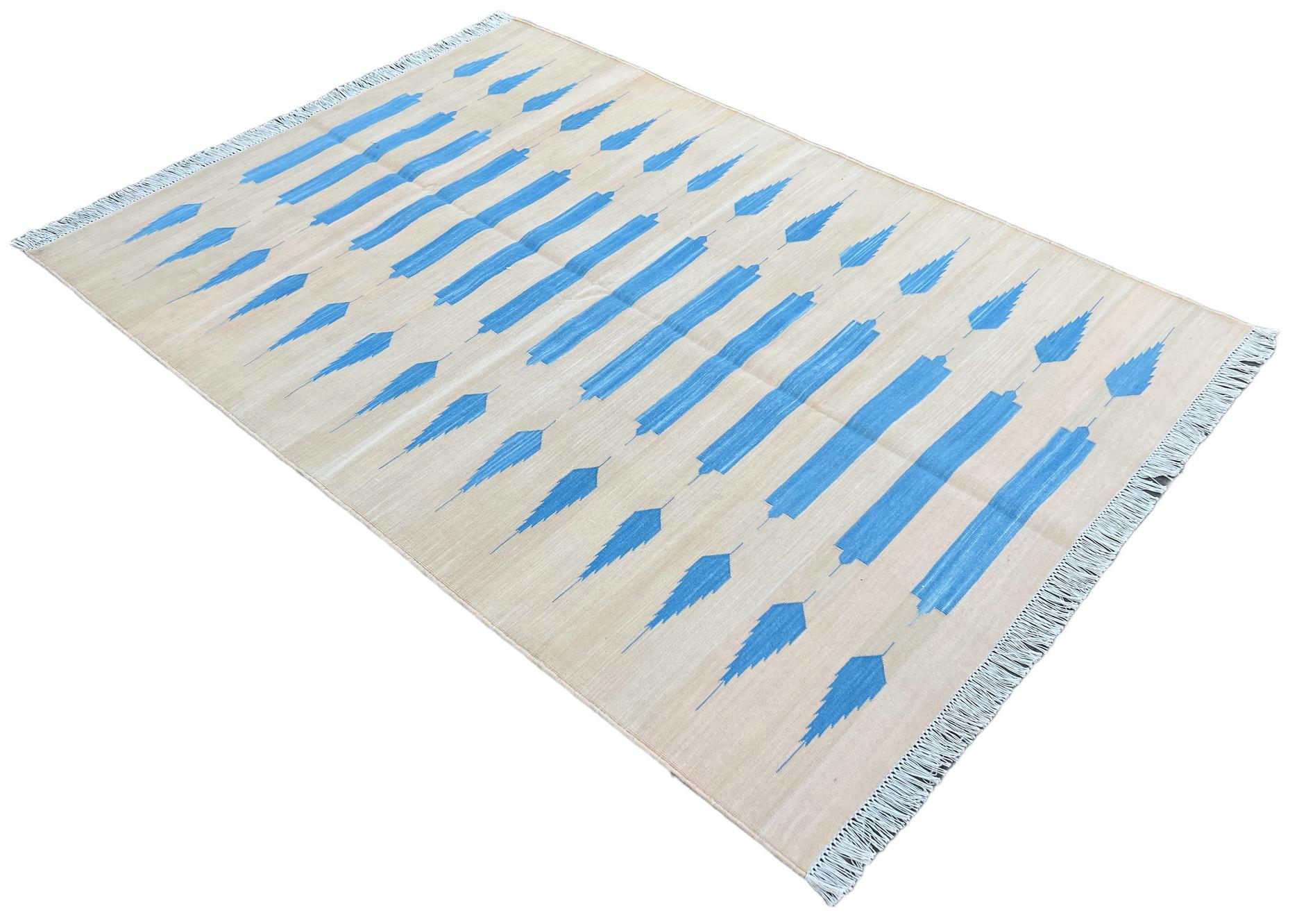 Cotton Vegetable Dyed Cream And Blue Striped Indian Dhurrie Rug-4'x6' 
These special flat-weave dhurries are hand-woven with 15 ply 100% cotton yarn. Due to the special manufacturing techniques used to create our rugs, the size and color of each