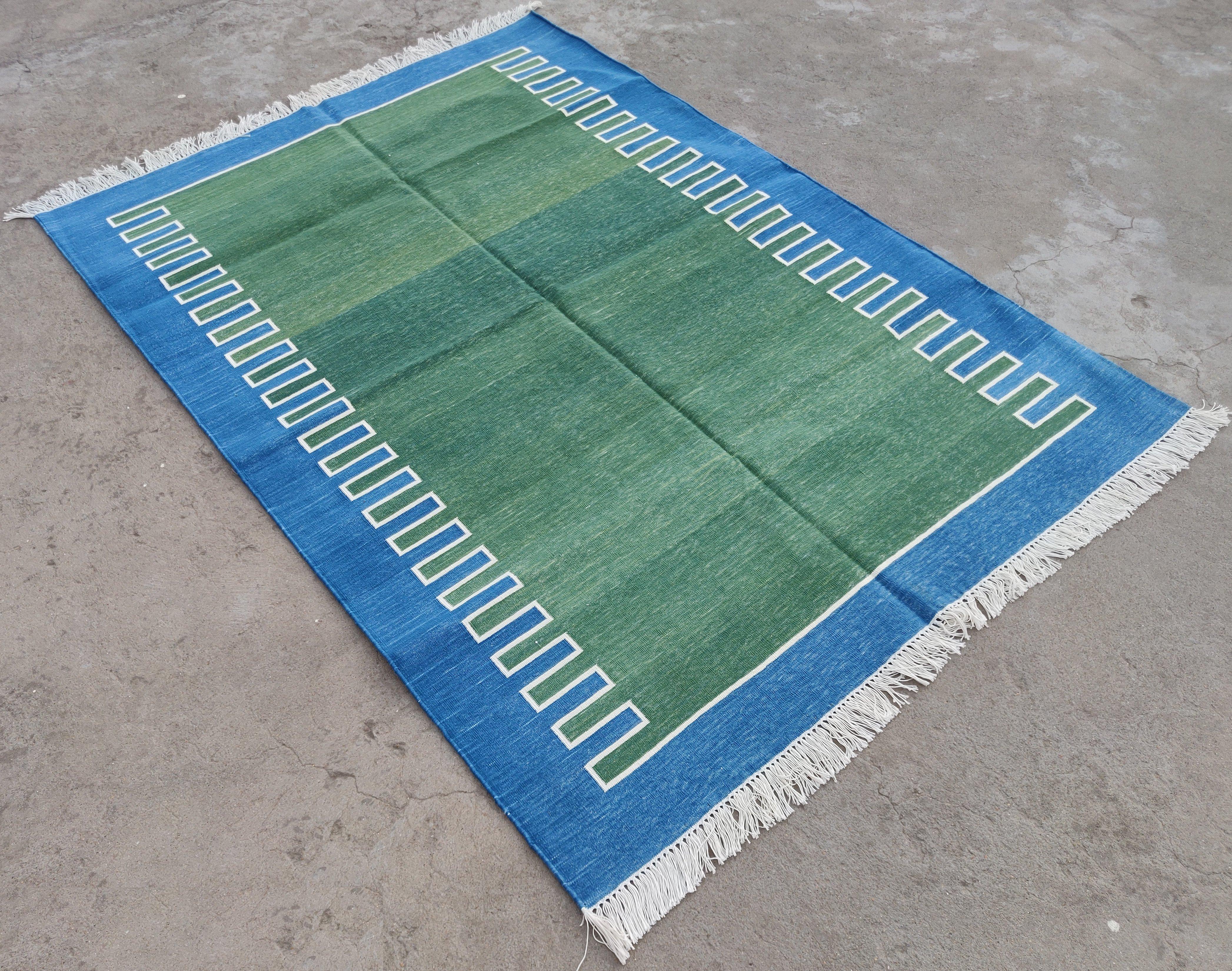 Cotton Vegetable Dyed Forest Green, Cream And Blue Zig Zag Striped Indian Dhurrie Rug-4'x6' 
These special flat-weave dhurries are hand-woven with 15 ply 100% cotton yarn. Due to the special manufacturing techniques used to create our rugs, the size
