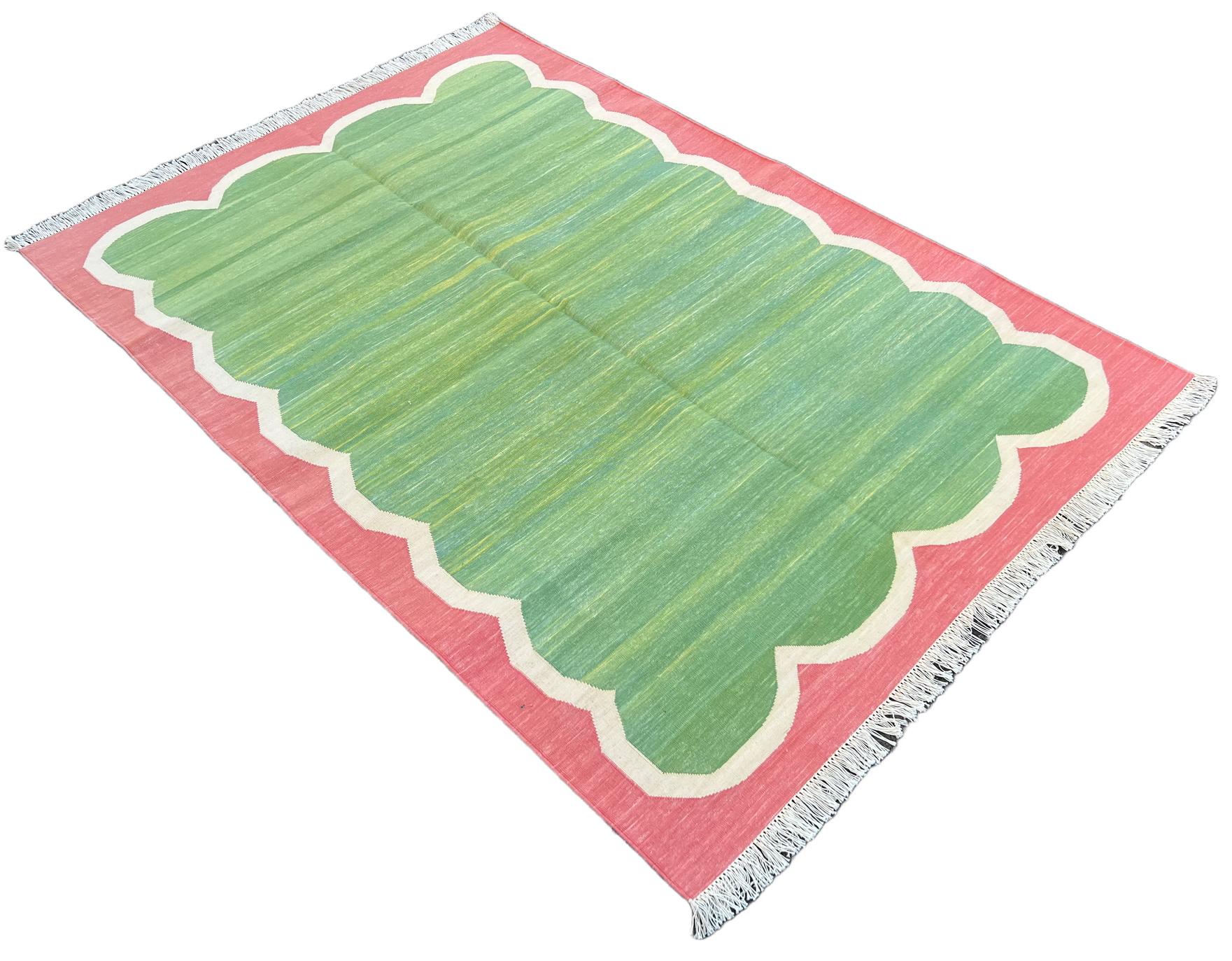 Cotton Vegetable Dyed Green, Cream And Coral Scalloped Striped Indian Dhurrie Rug-4'x6' 
These special flat-weave dhurries are hand-woven with 15 ply 100% cotton yarn. Due to the special manufacturing techniques used to create our rugs, the size and