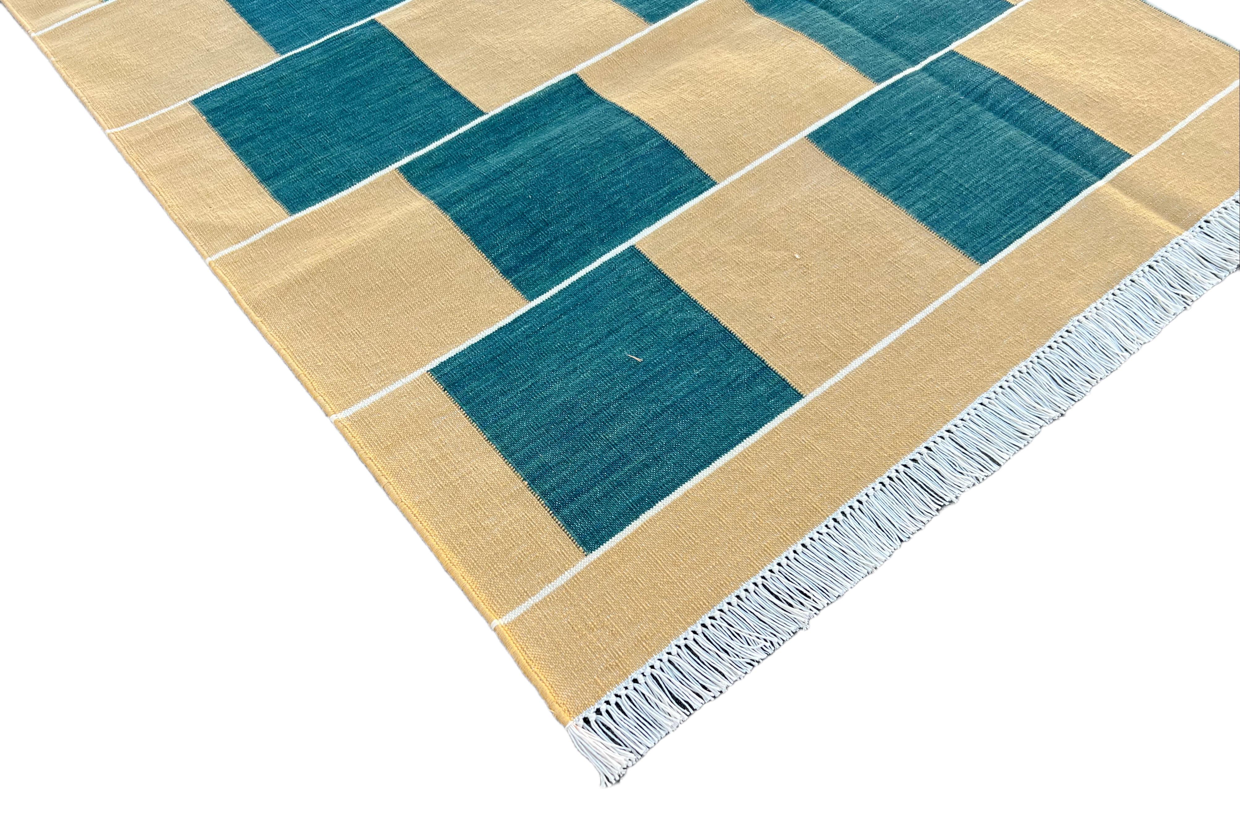 Cotton Vegetable Dyed Green and Mustard Checked Indian Dhurrie Rug-4'x6' 

These special flat-weave dhurries are hand-woven with 15 ply 100% cotton yarn. Due to the special manufacturing techniques used to create our rugs, the size and color of each